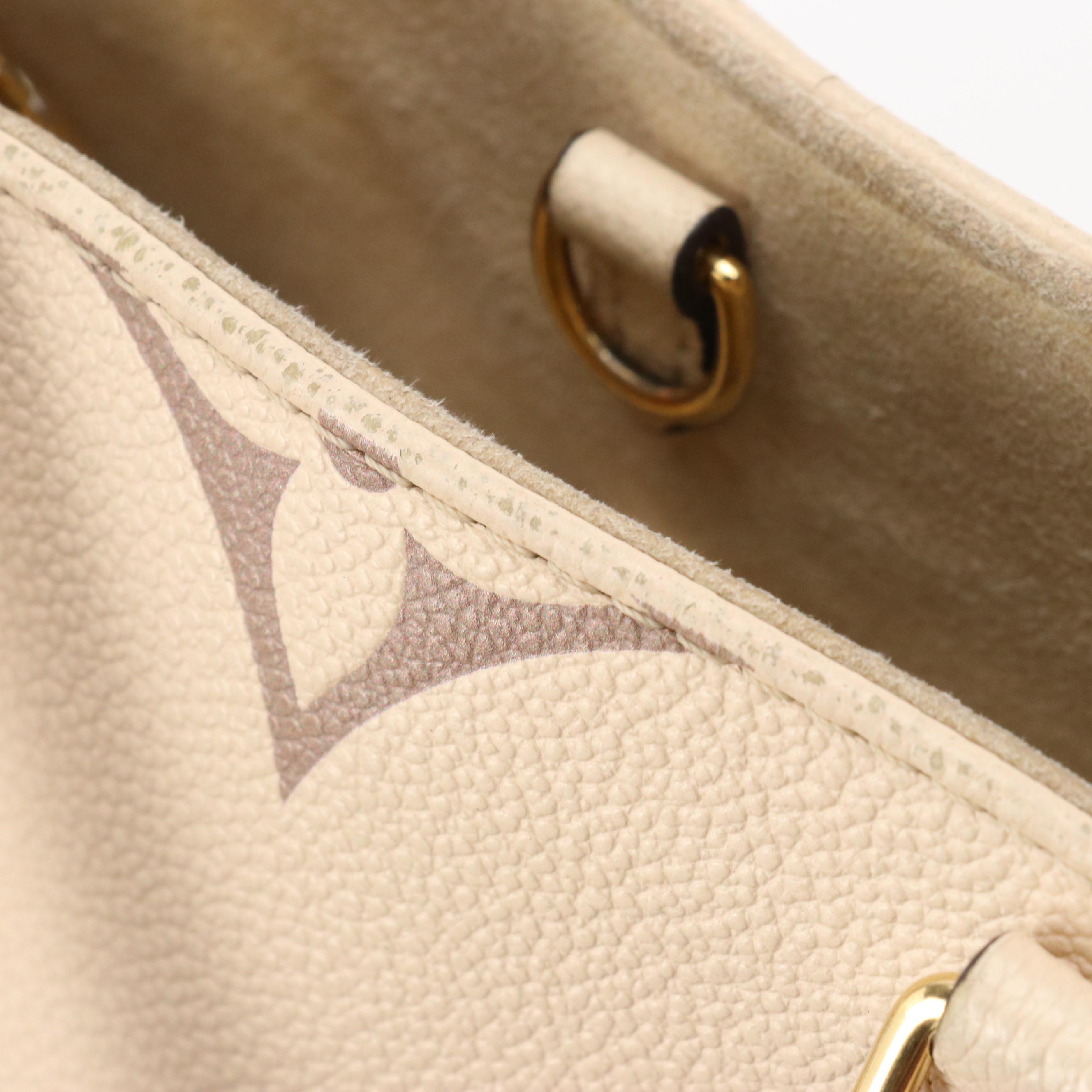 Louis Vuitton OnTheGo PM Two-Way Tote in Dove & Cream Monogram Empreinte Leather