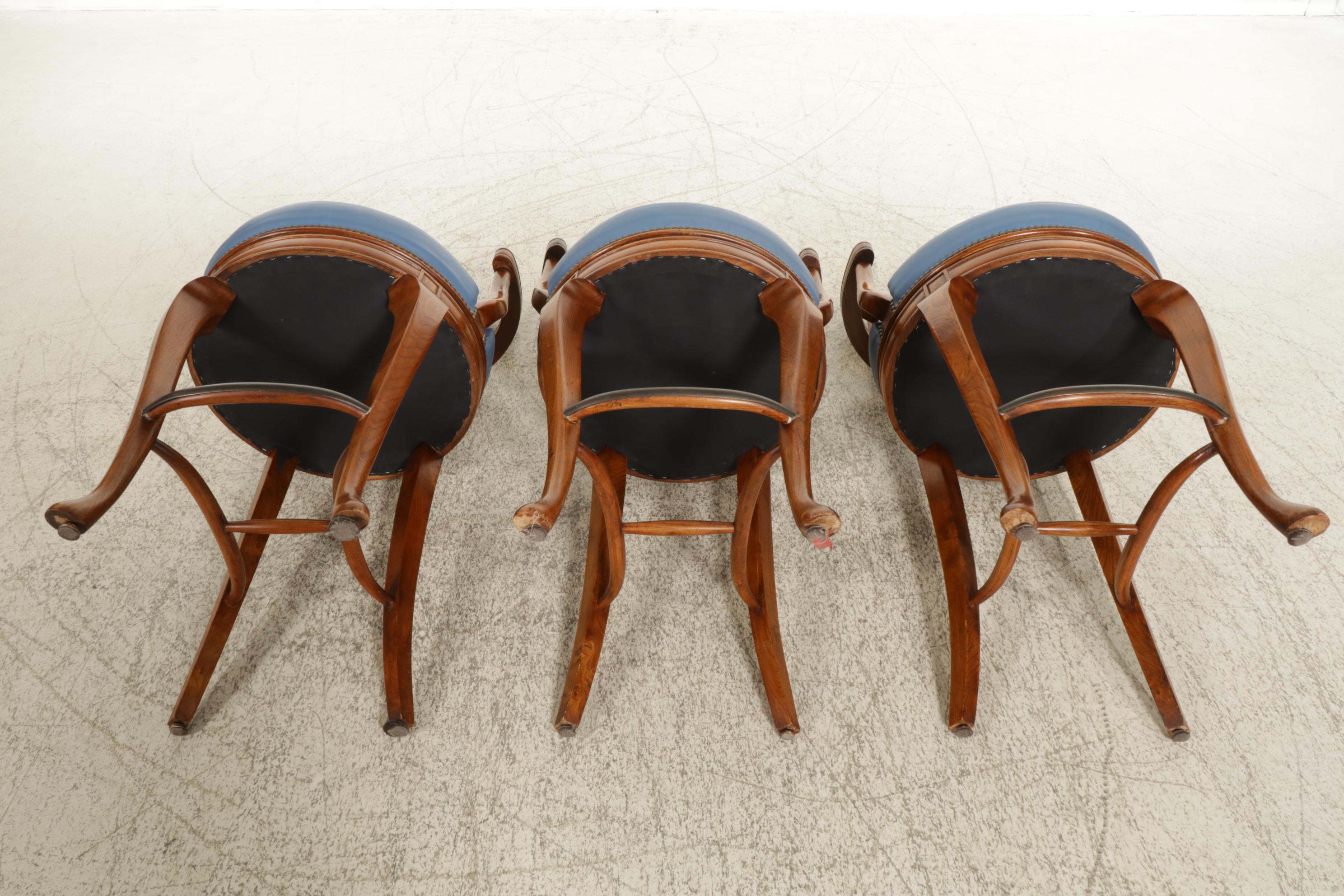 Three Leather Upholstered Walnut Swivel Bar Stools, 21st Century