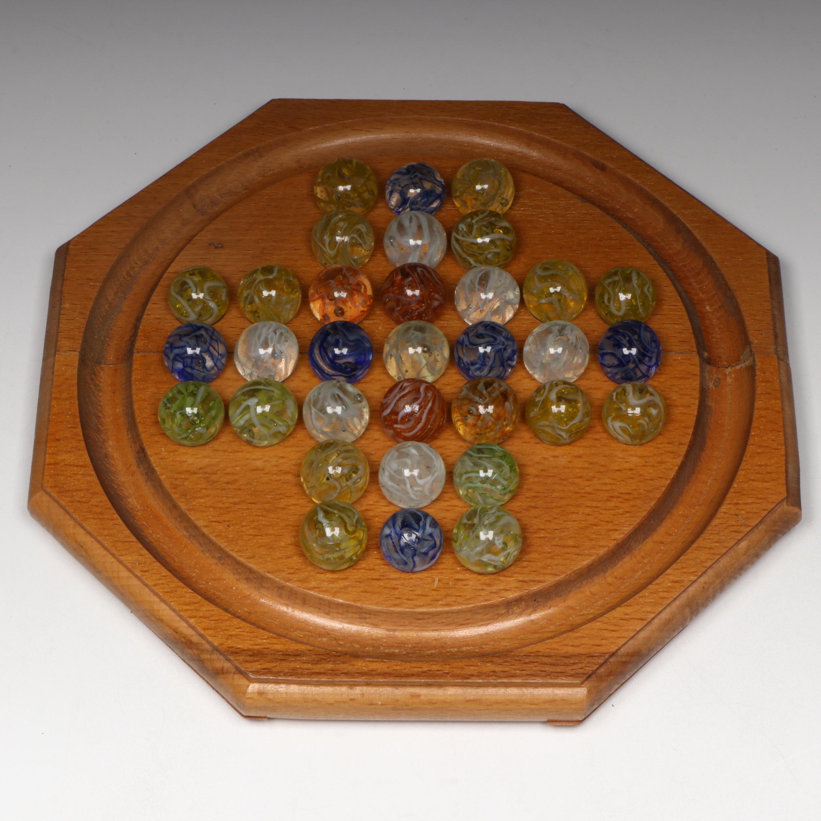 H. P. Gibson & Sons Solitaire Game in Box and Veiligglas Wire Pull Glass Marbles