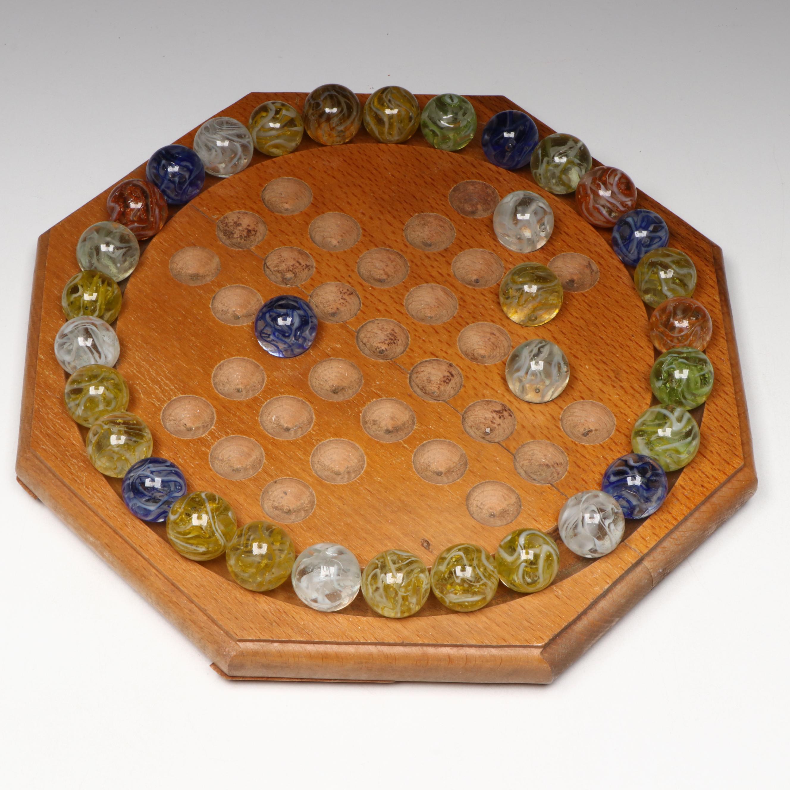 H. P. Gibson & Sons Solitaire Game in Box and Veiligglas Wire Pull Glass Marbles
