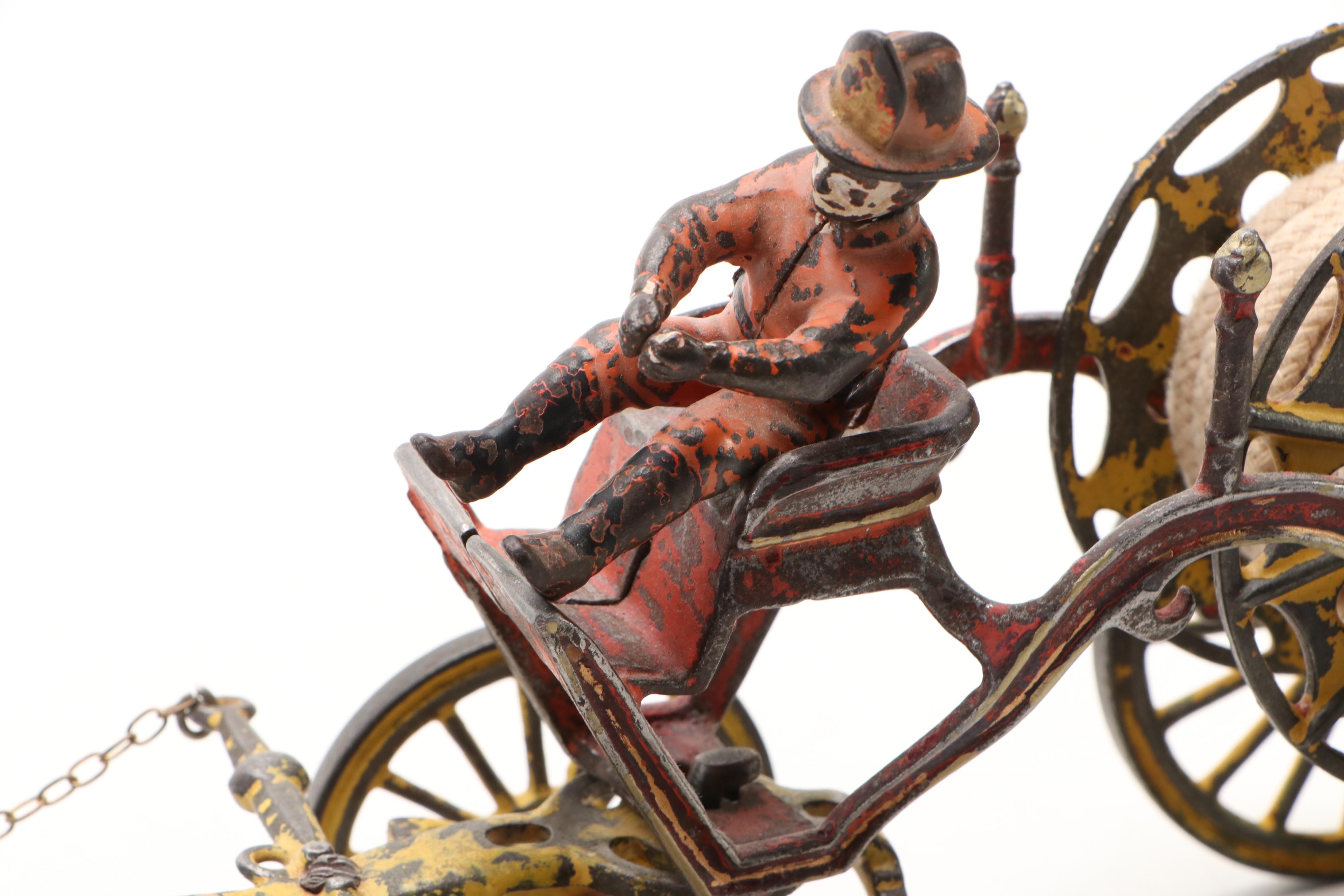 Painted Cast Iron Horse and Fire Hose Wagon Toy, Late 19th / Early 20th Century