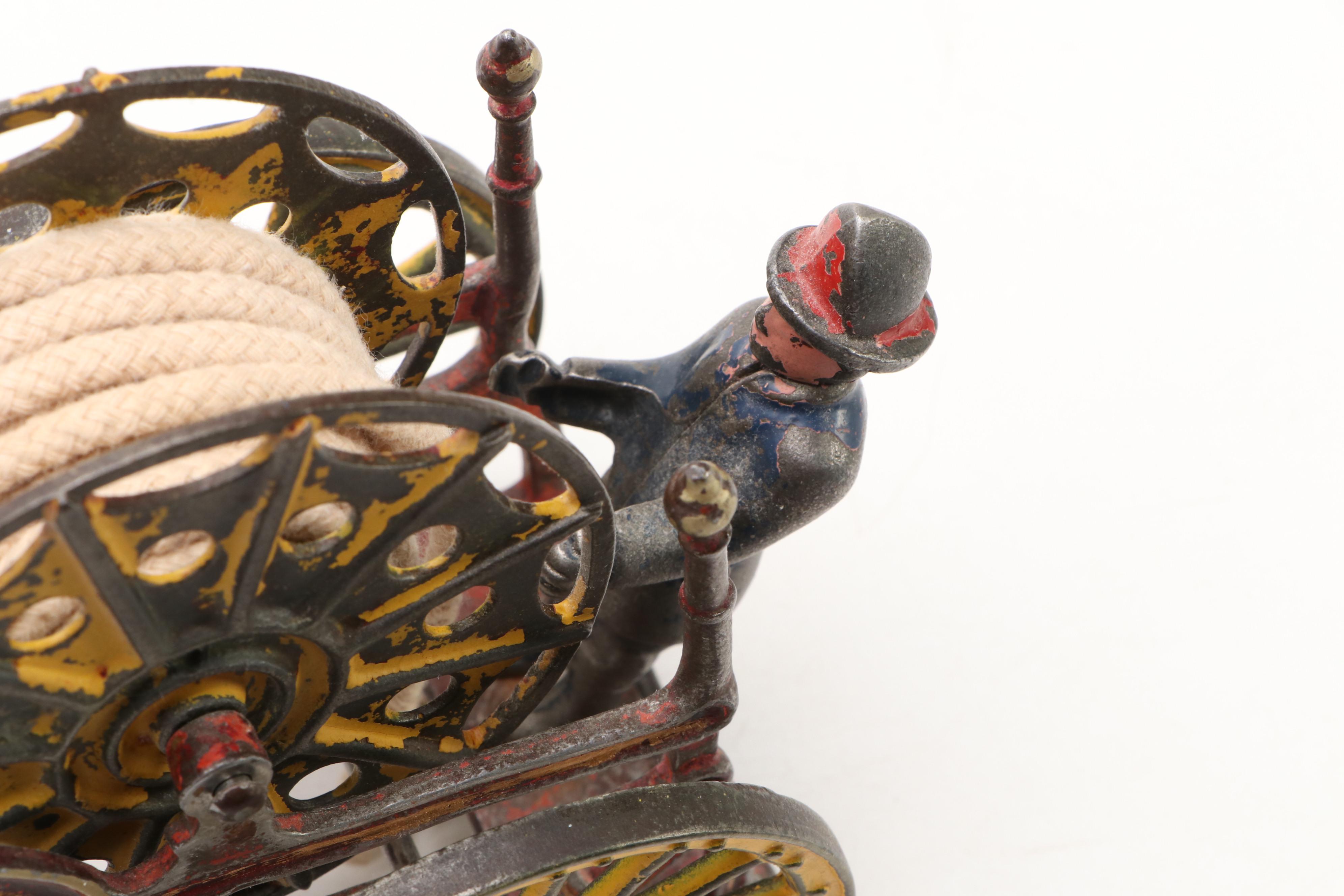 Painted Cast Iron Horse and Fire Hose Wagon Toy, Late 19th / Early 20th Century