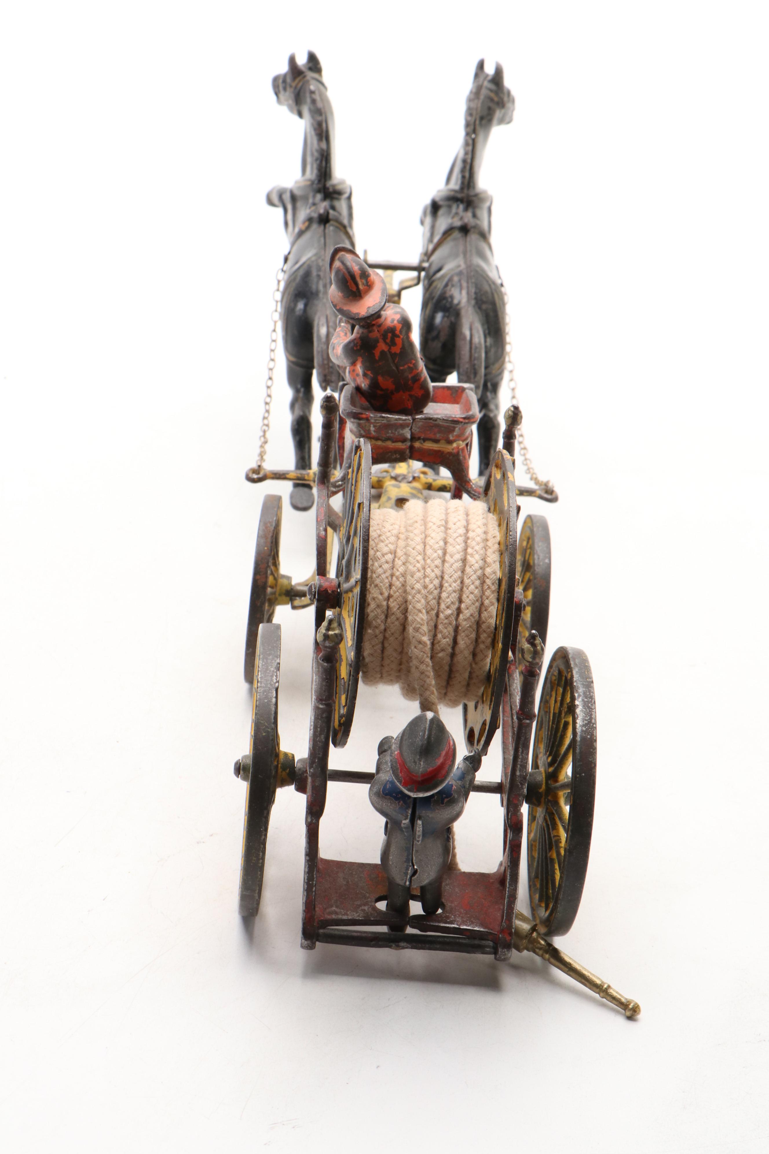 Painted Cast Iron Horse and Fire Hose Wagon Toy, Late 19th / Early 20th Century