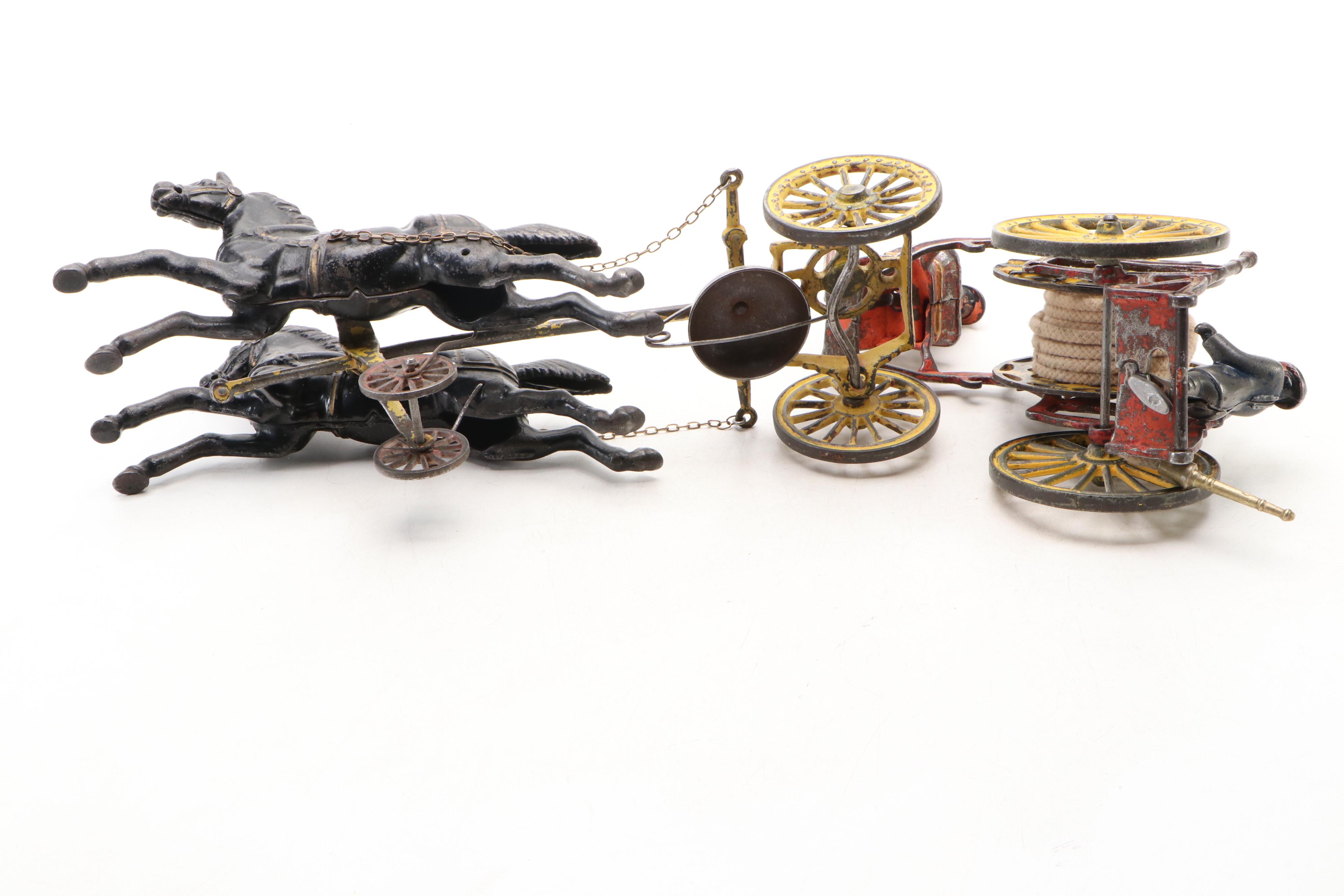 Painted Cast Iron Horse and Fire Hose Wagon Toy, Late 19th / Early 20th Century