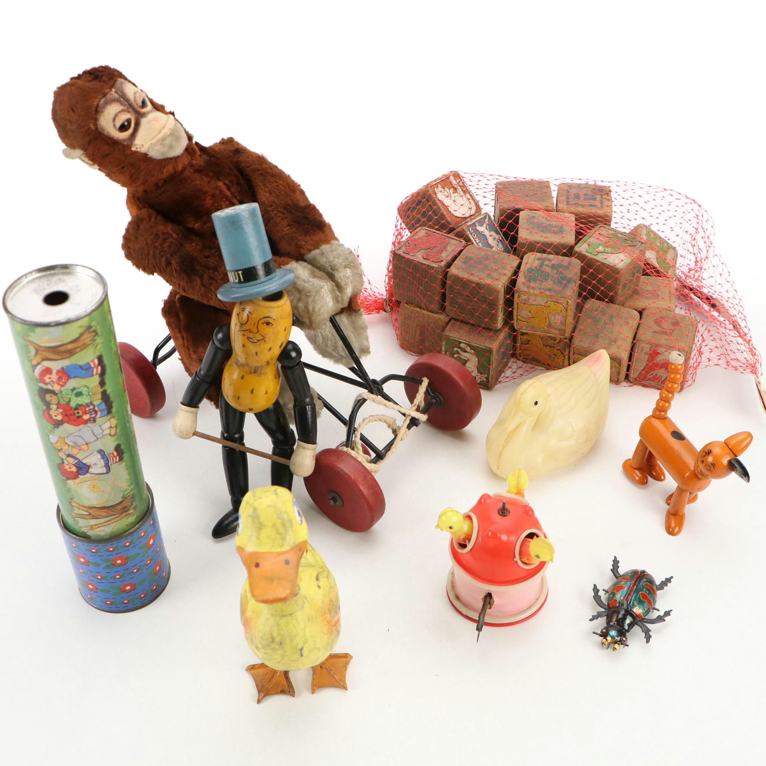 Stuffed Monkey Pull Toy with Kaleidoscope, Articulated Mr. Peanut Toy and More
