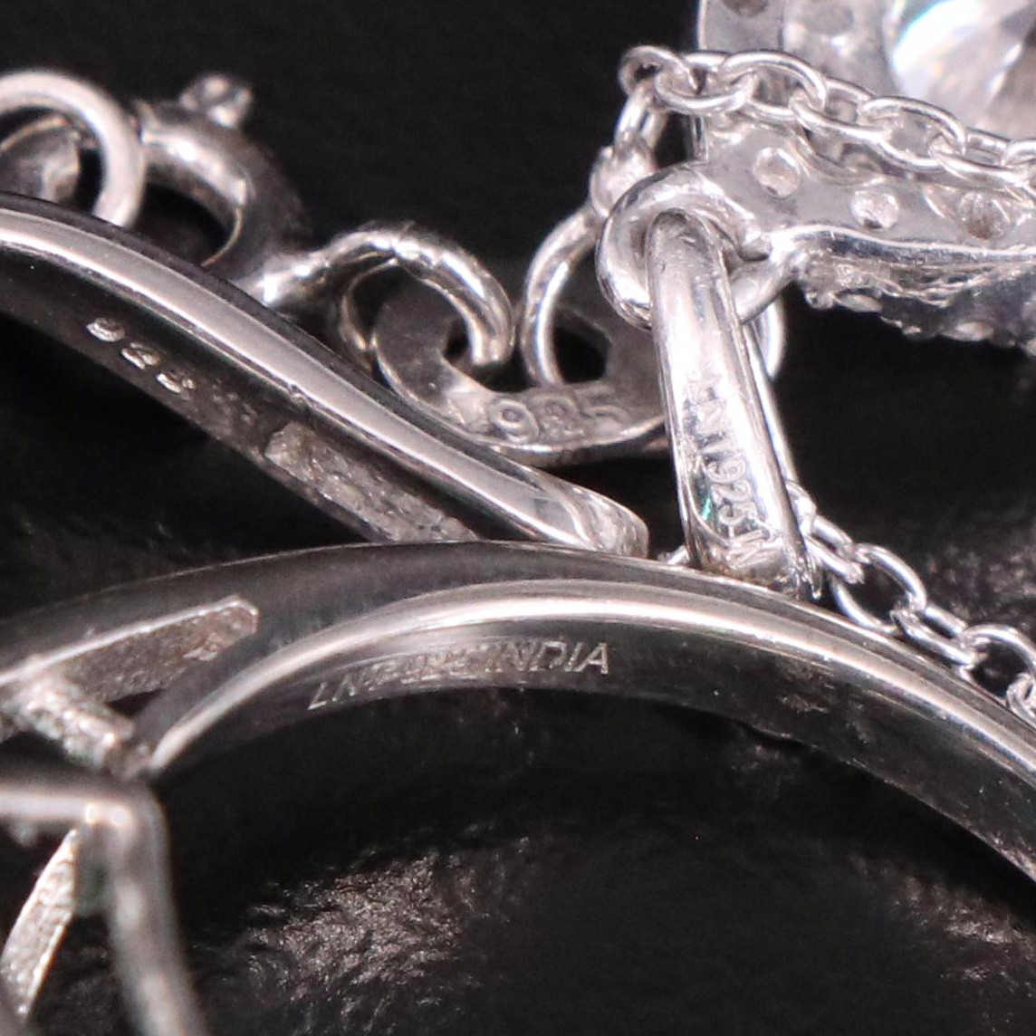 14 Assorted Sterling Silver Rings, Necklaces, Earrings, and Pendants