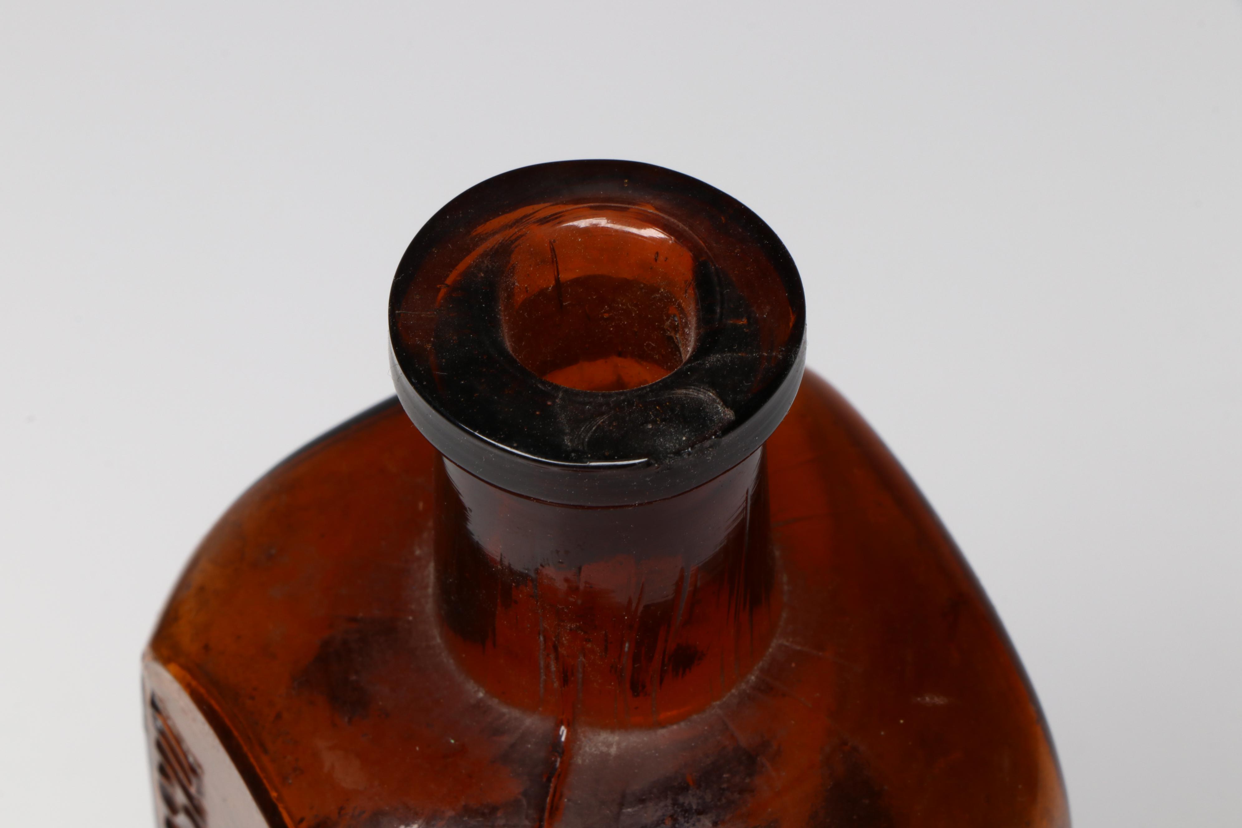 Railroad Mills, Emerson Drug Co. and Other Bottles and Crate, Early 20th Century