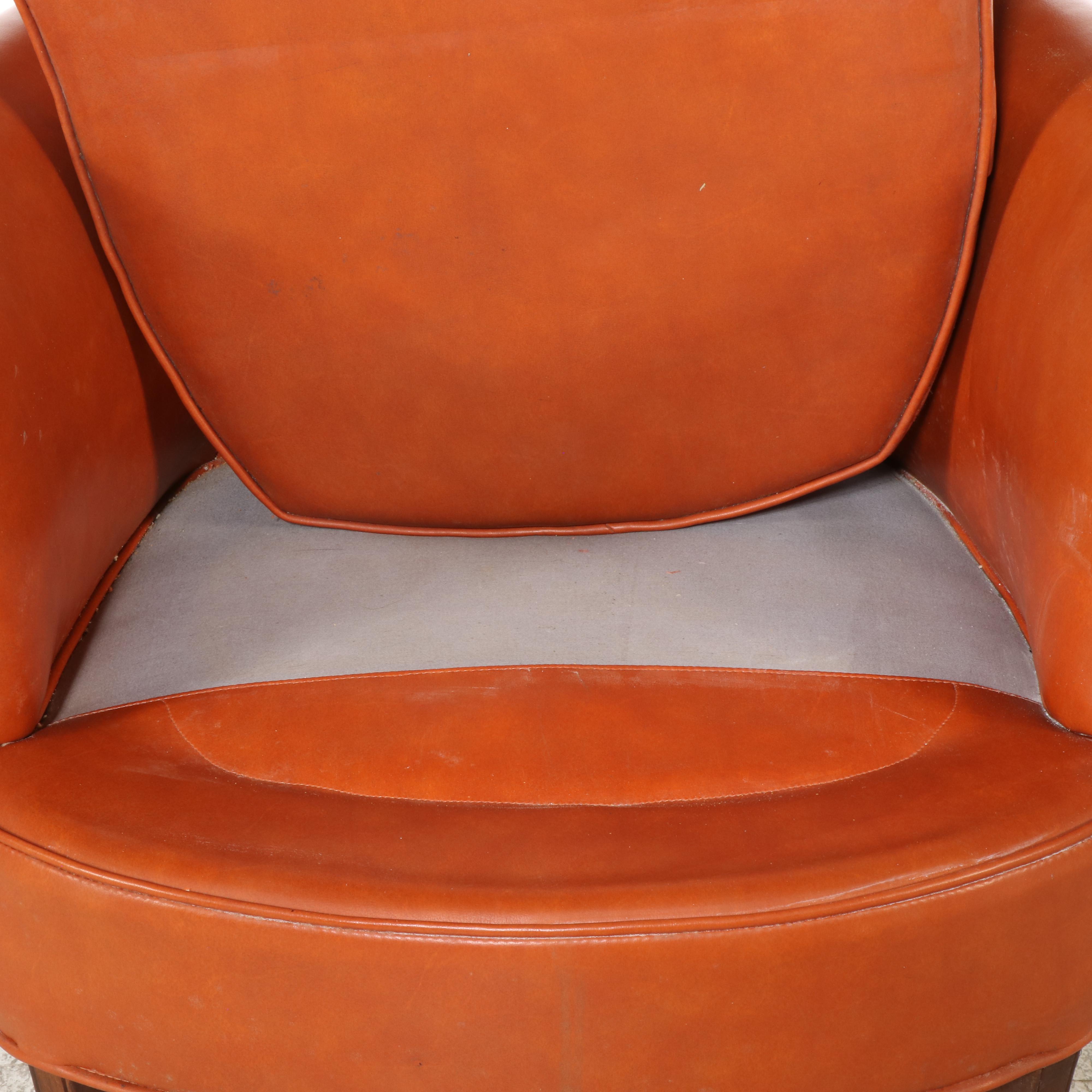Pair of Modernist Buttoned-Down Orange Vinyl Club Chairs
