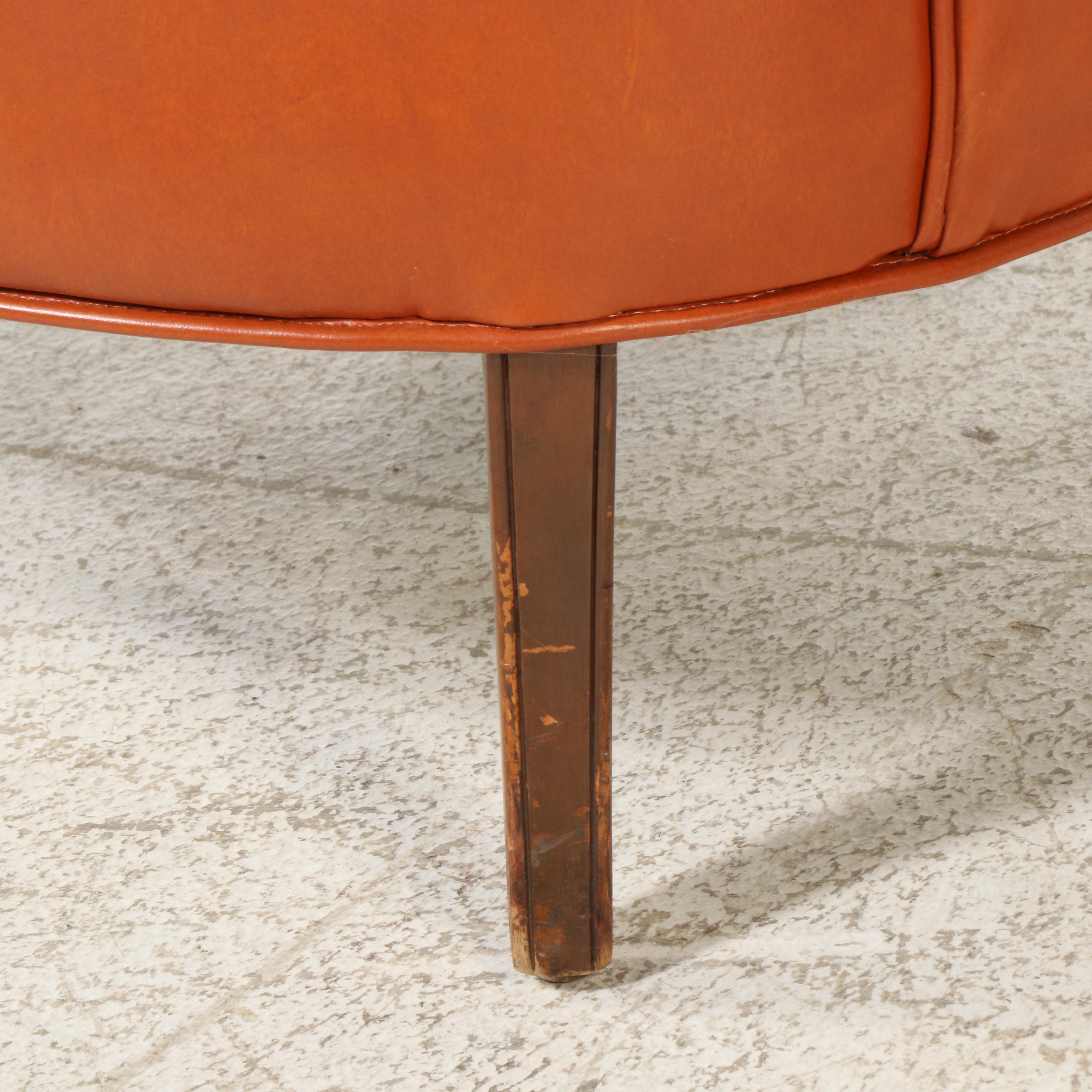 Pair of Modernist Buttoned-Down Orange Vinyl Club Chairs