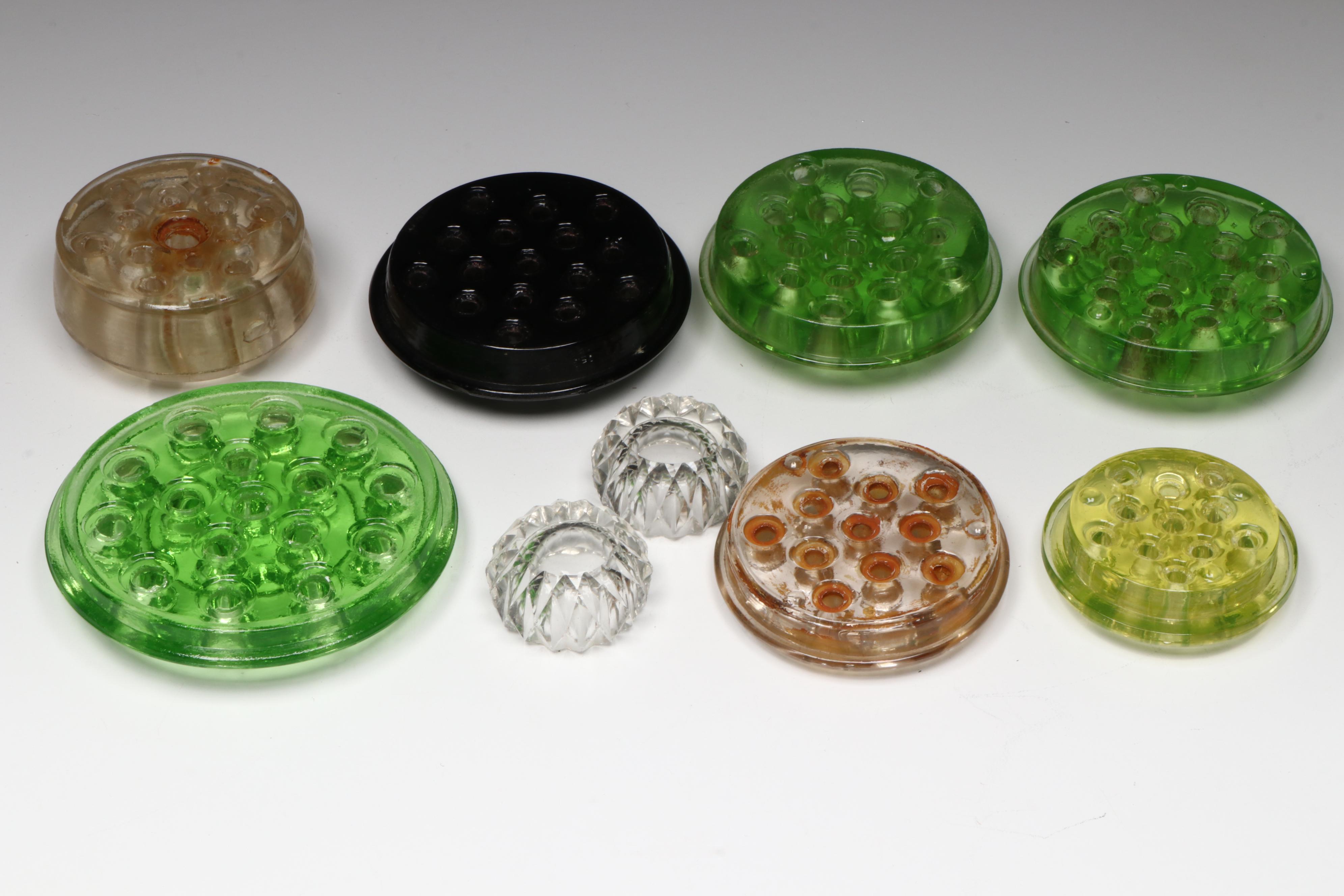 Glass and Vaseline Glass Flower Frogs with Marble Stands and Jeweler's Loupes