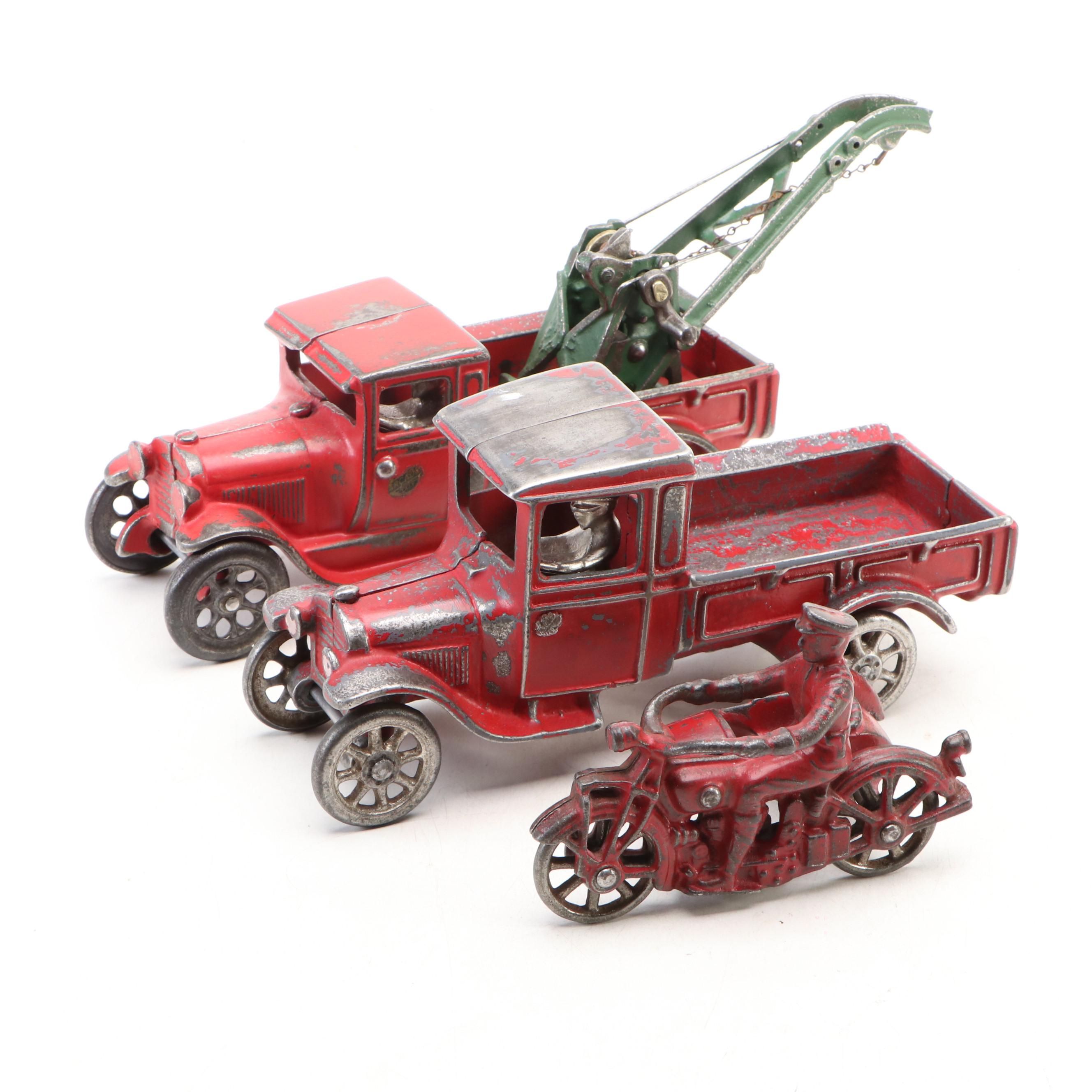 Arcade Cast Iron Toy Truck, Tow Truck and Motorcycle, Early to Mid-20th Century