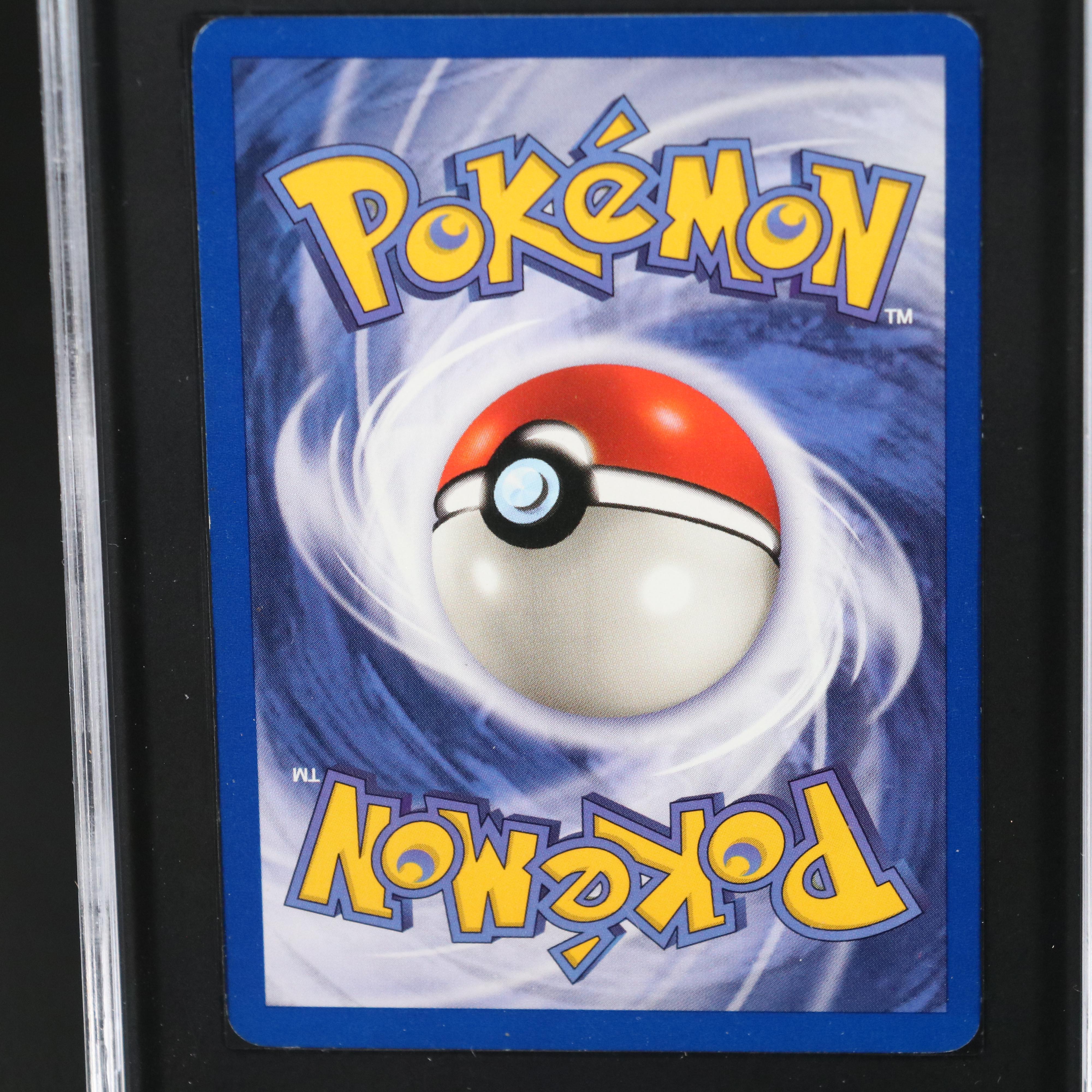 Team Rocket Dark Charizard 1st Edition Pokémon Card Graded SGC 8