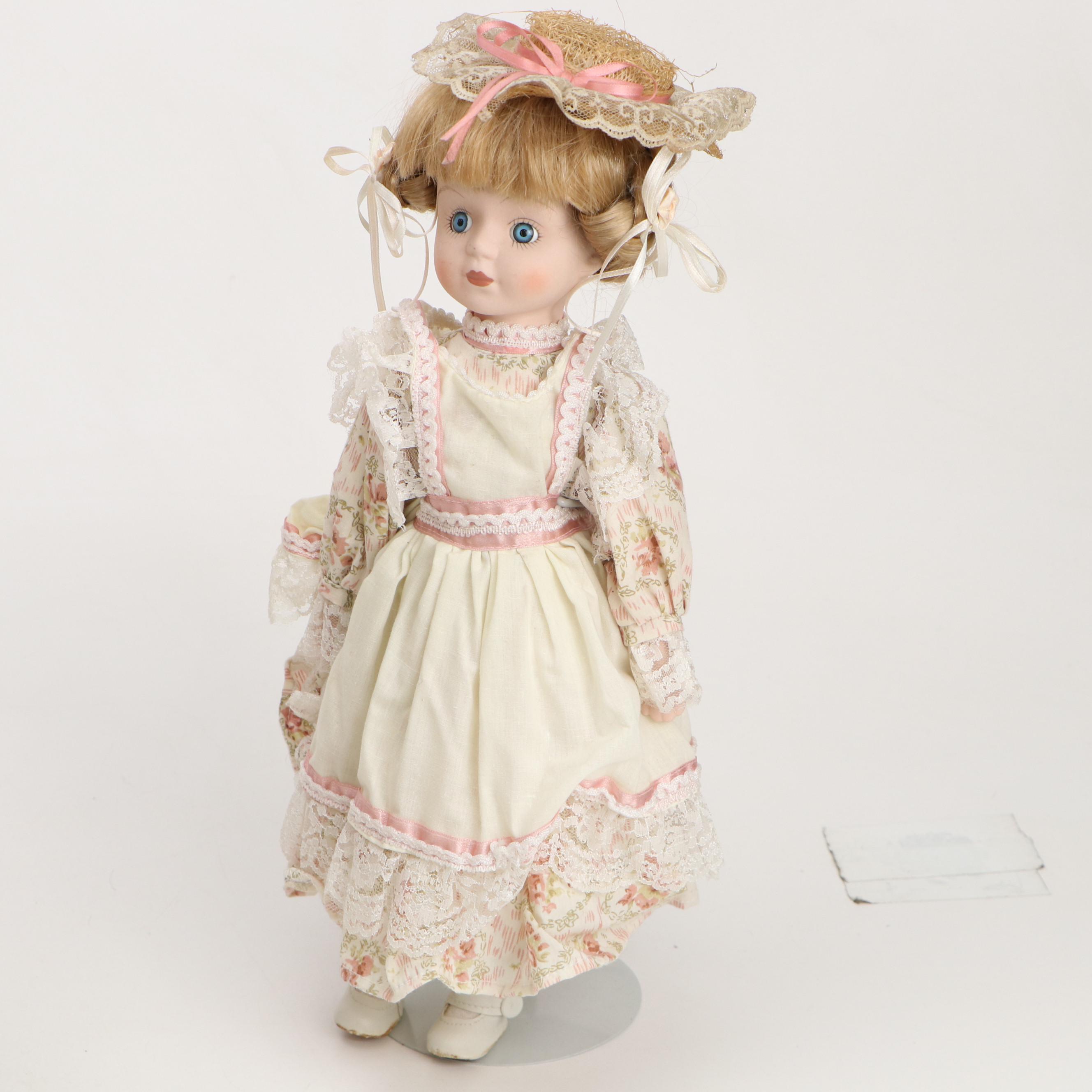 Porcelain Dolls in Dresses with Lace