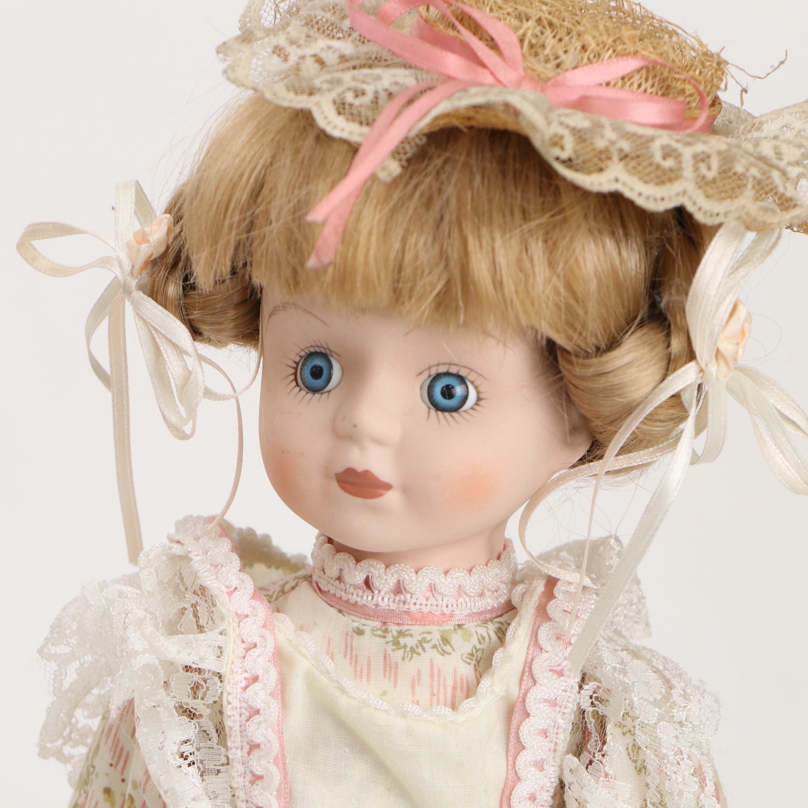 Porcelain Dolls in Dresses with Lace