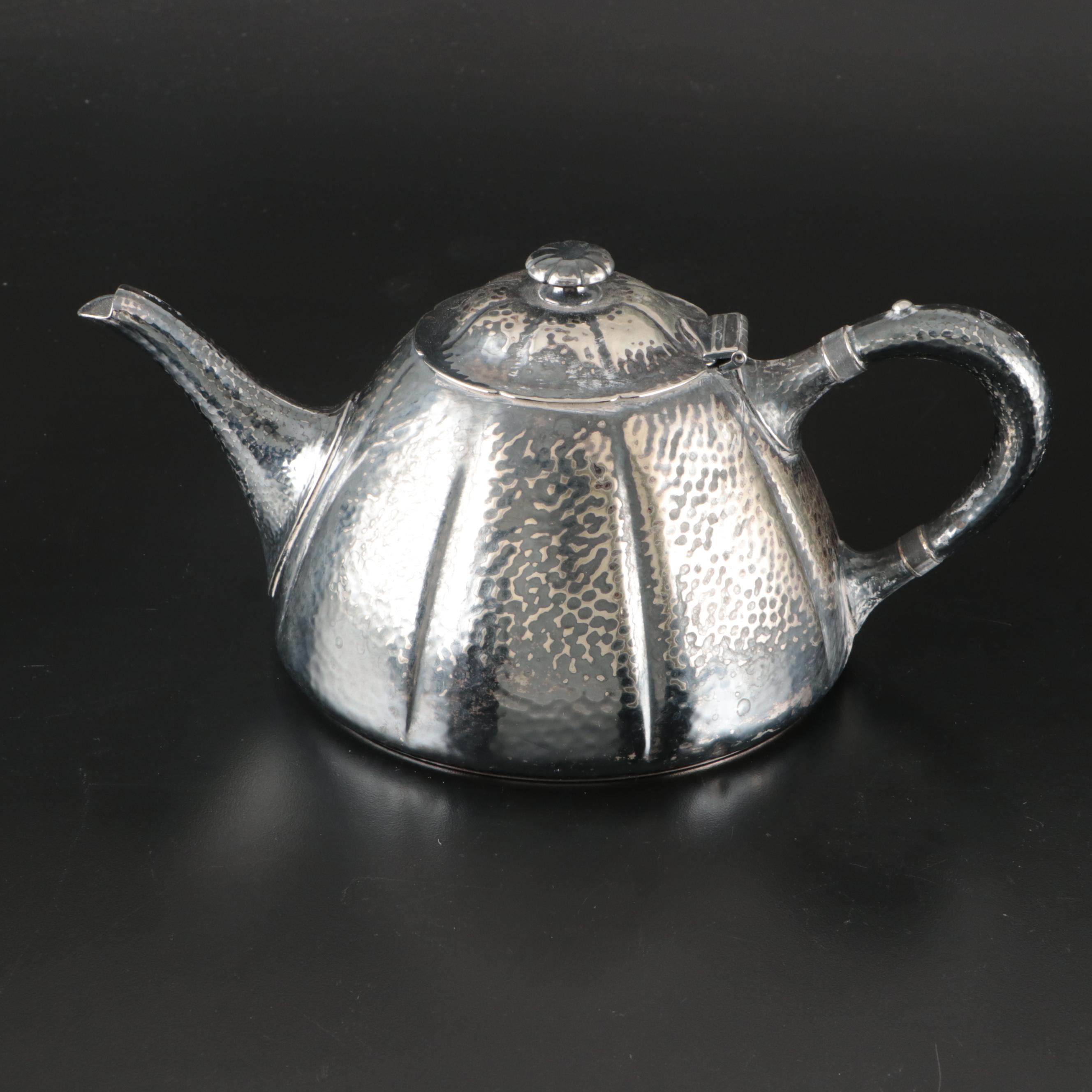 International Silver Hammered Silver Plate Teapot, Sugar Bowl, and Creamer