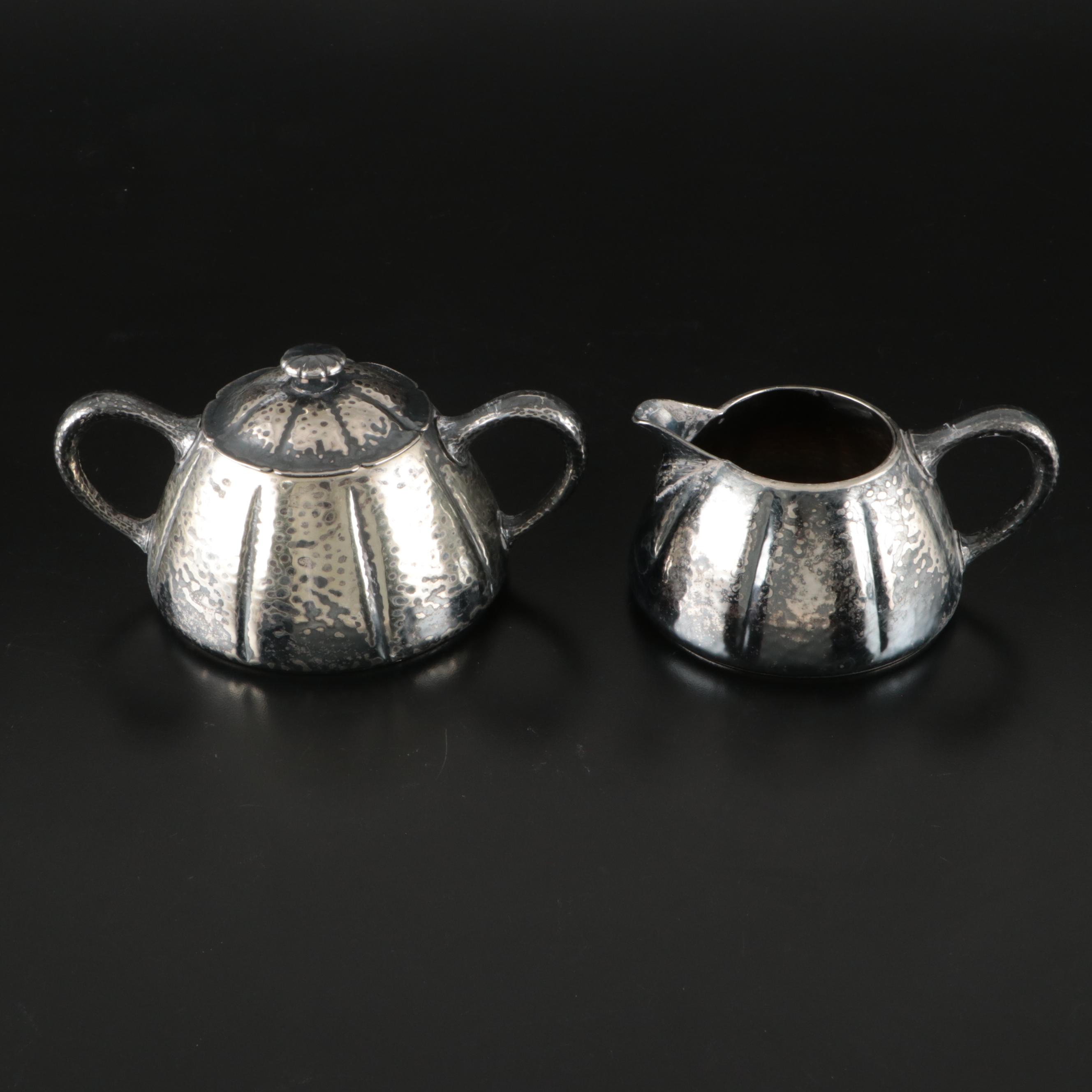 International Silver Hammered Silver Plate Teapot, Sugar Bowl, and Creamer