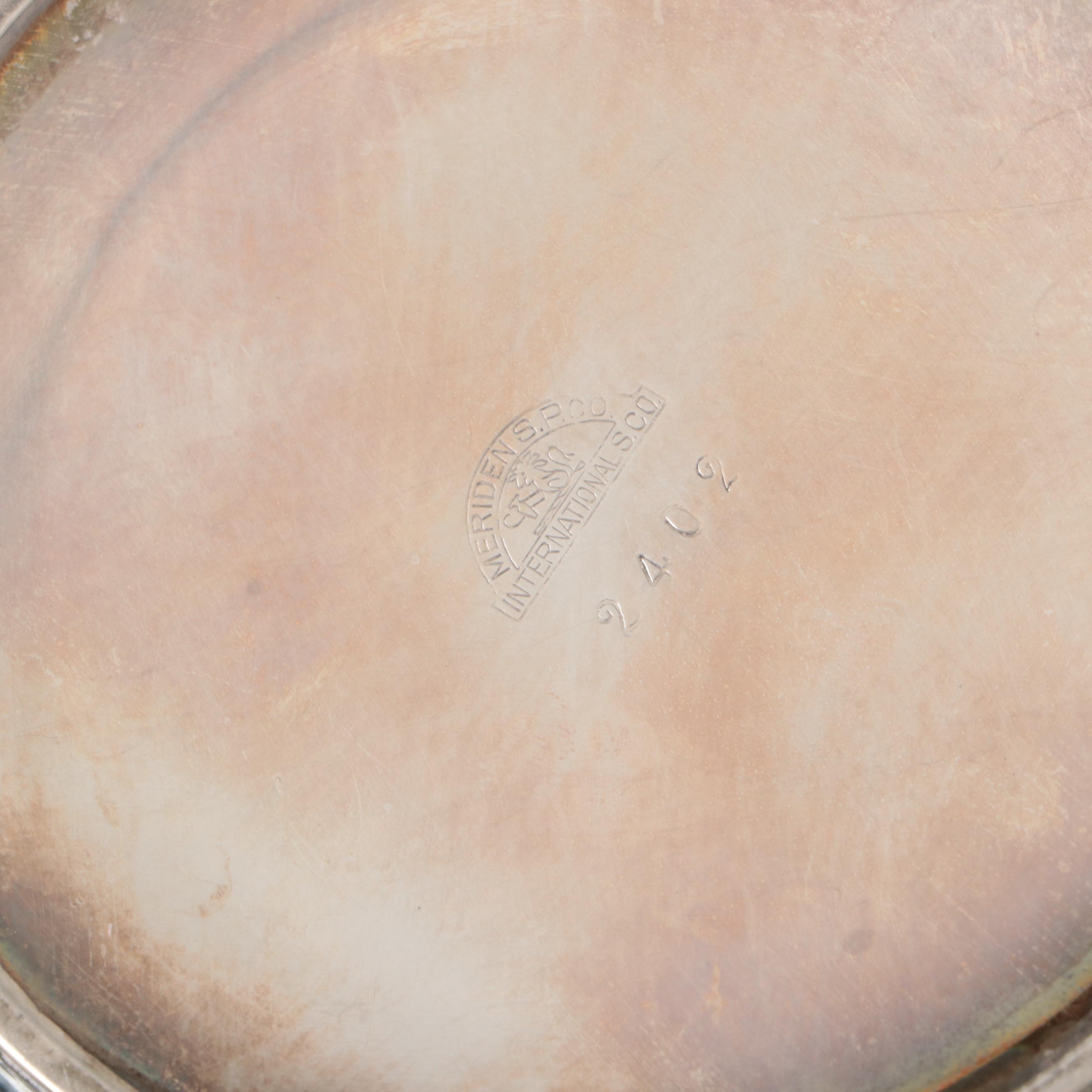 International Silver Hammered Silver Plate Teapot, Sugar Bowl, and Creamer