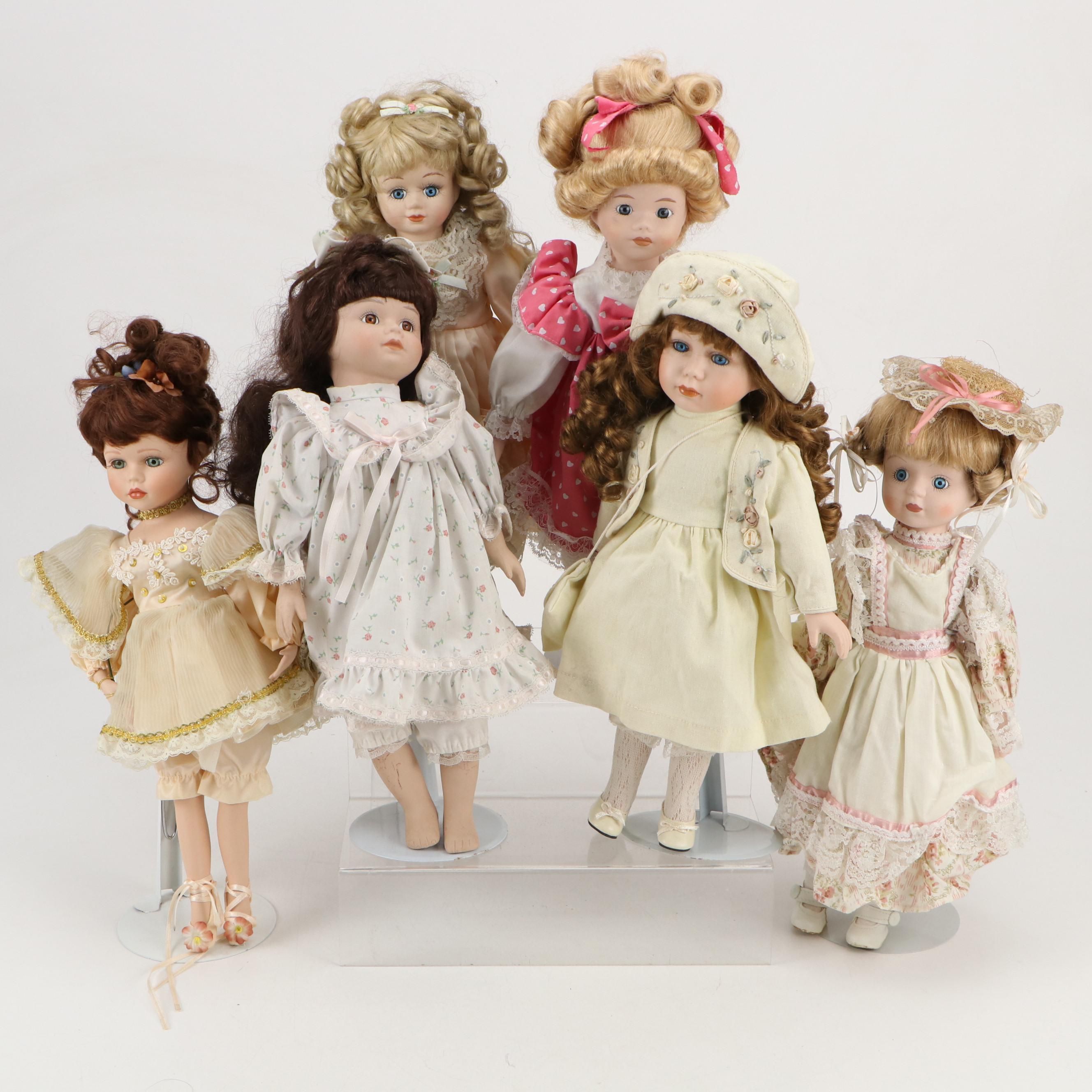 Porcelain Dolls in Dresses with Lace