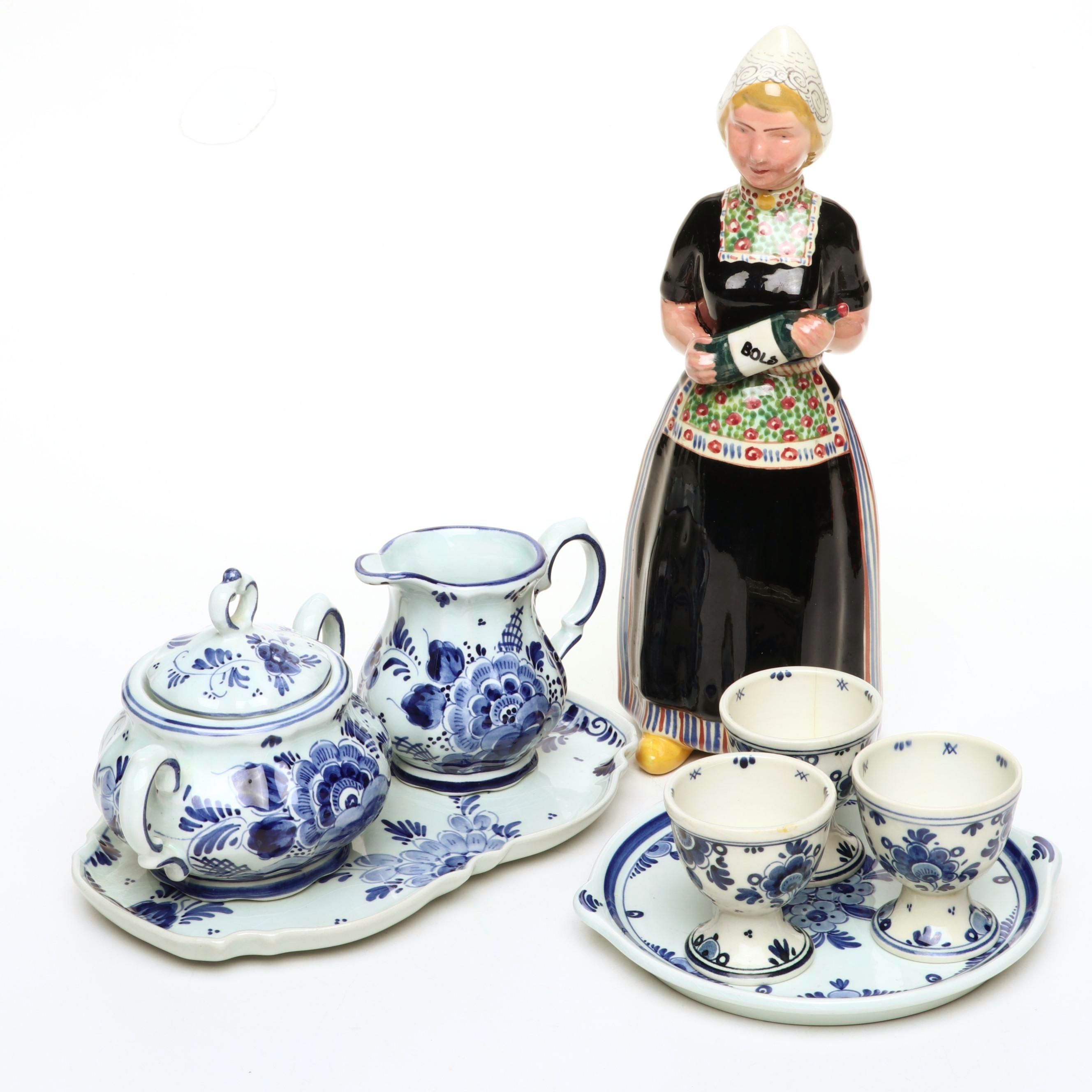 Bols Dutch Girl Decanter with Delft Blue Trays, Egg Cups, Creamer and Sugar Bowl