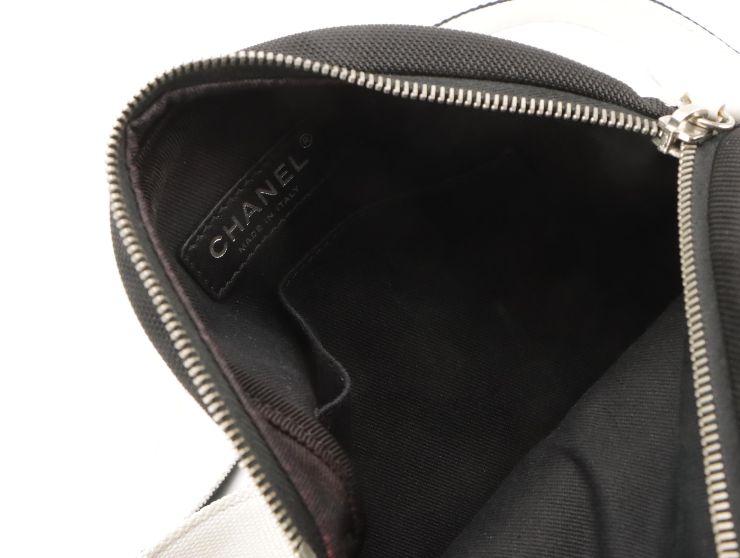 Chanel Airlines Round Crossbody Bag in Multicolored Rubber & Black Toile Canvas