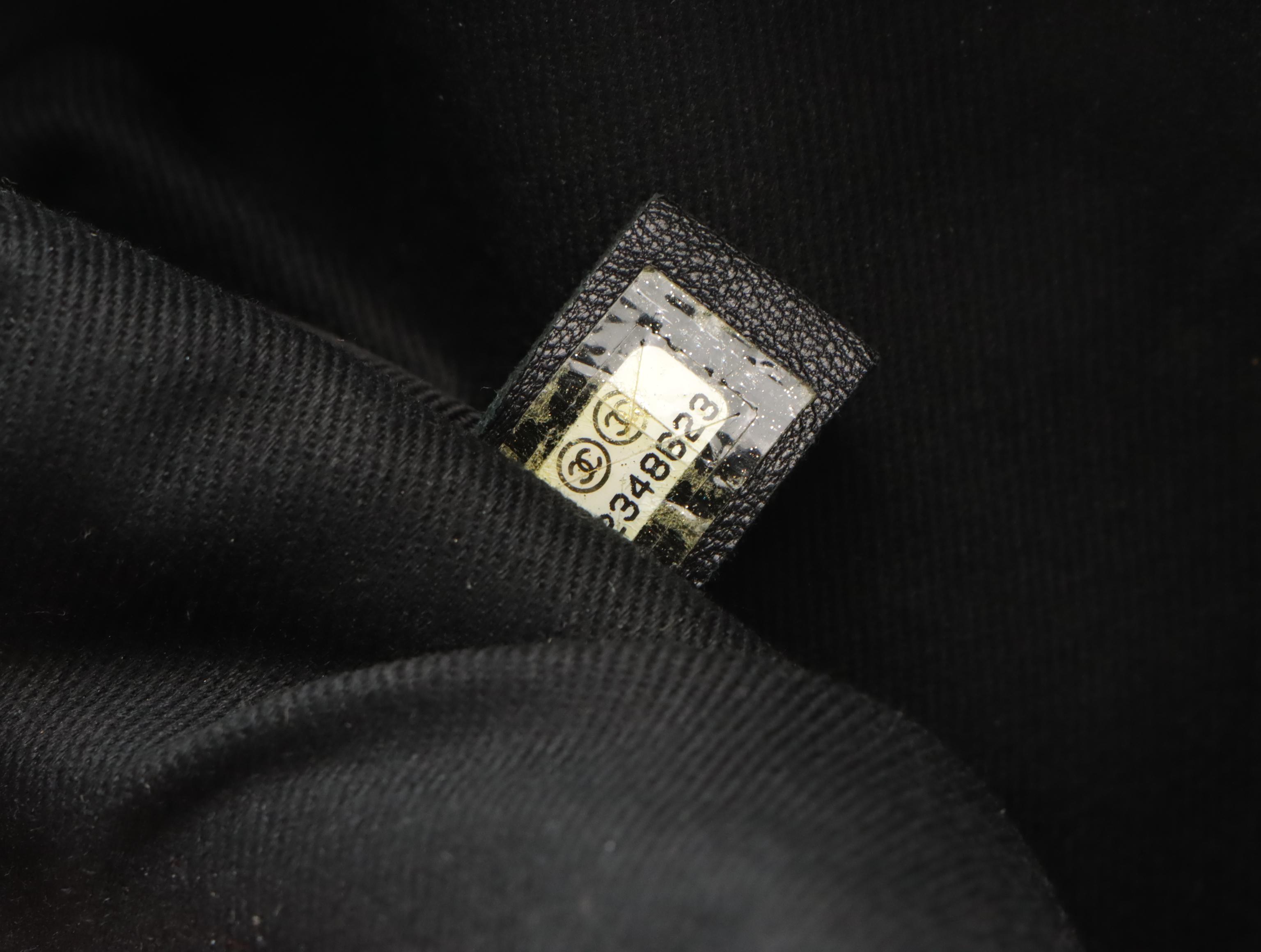 Chanel Airlines Round Crossbody Bag in Multicolored Rubber & Black Toile Canvas