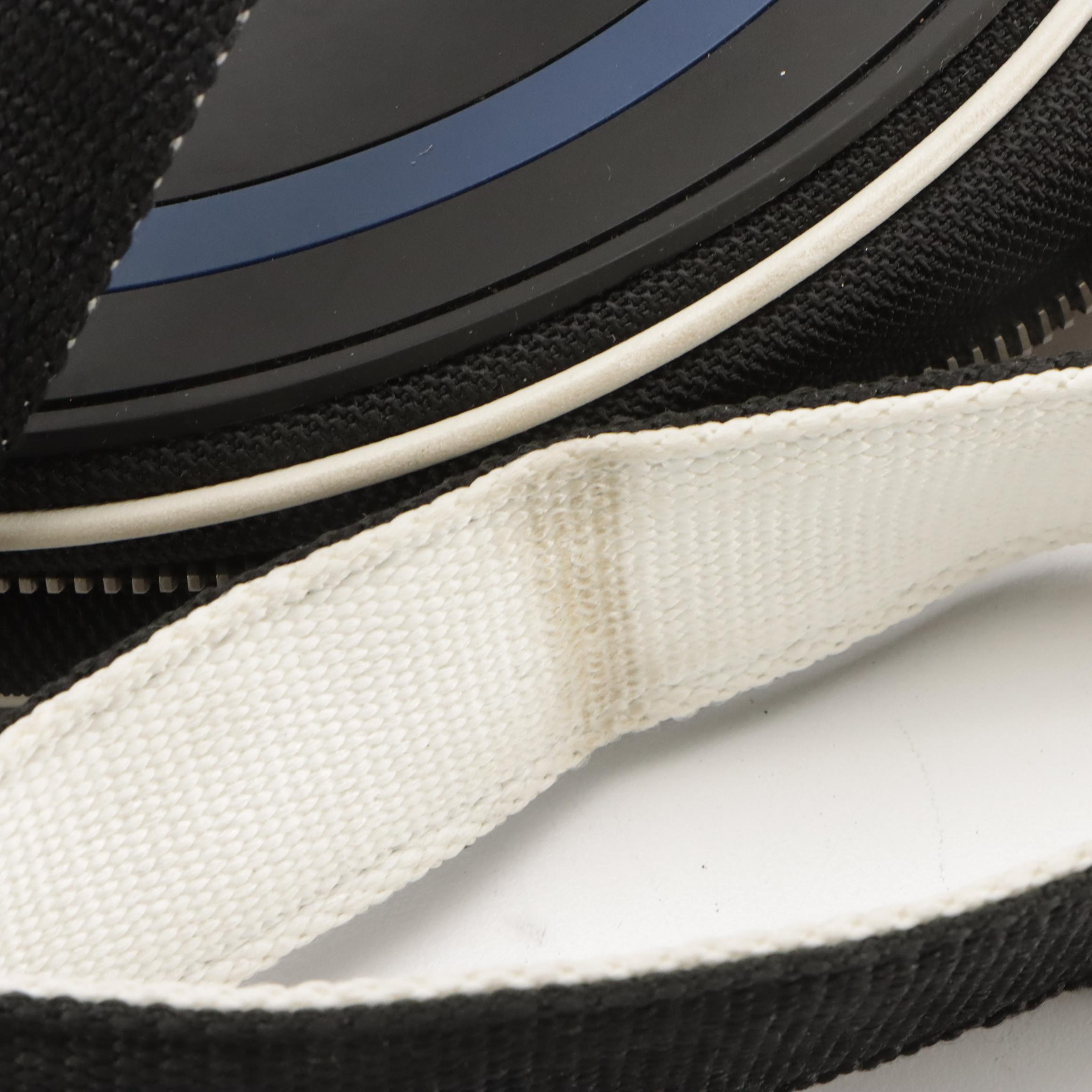 Chanel Airlines Round Crossbody Bag in Multicolored Rubber & Black Toile Canvas