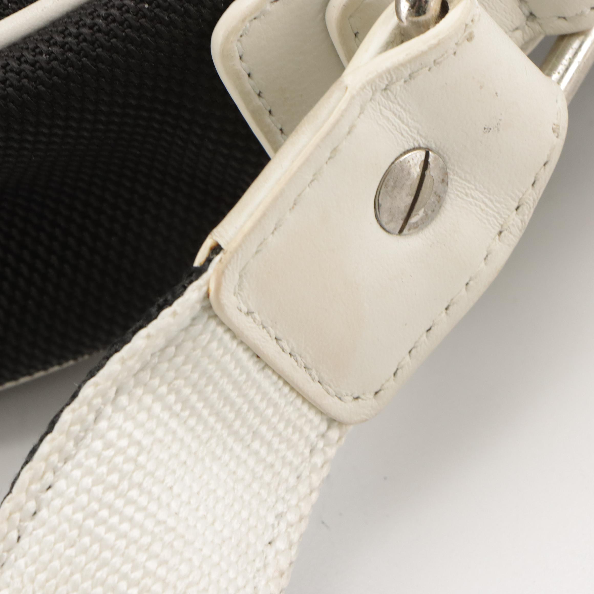 Chanel Airlines Round Crossbody Bag in Multicolored Rubber & Black Toile Canvas