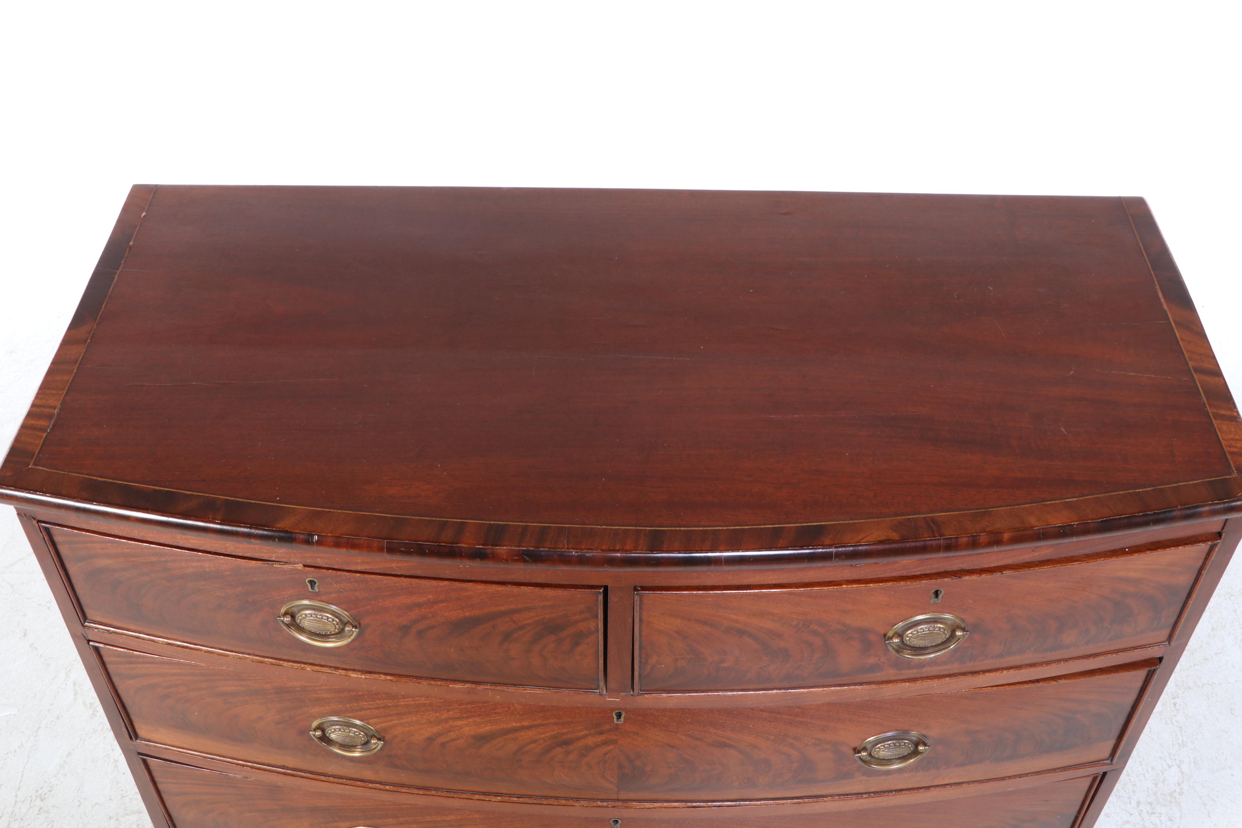 George III Flame Mahogany Five-Drawer Bowfront Chest, Circa 1800