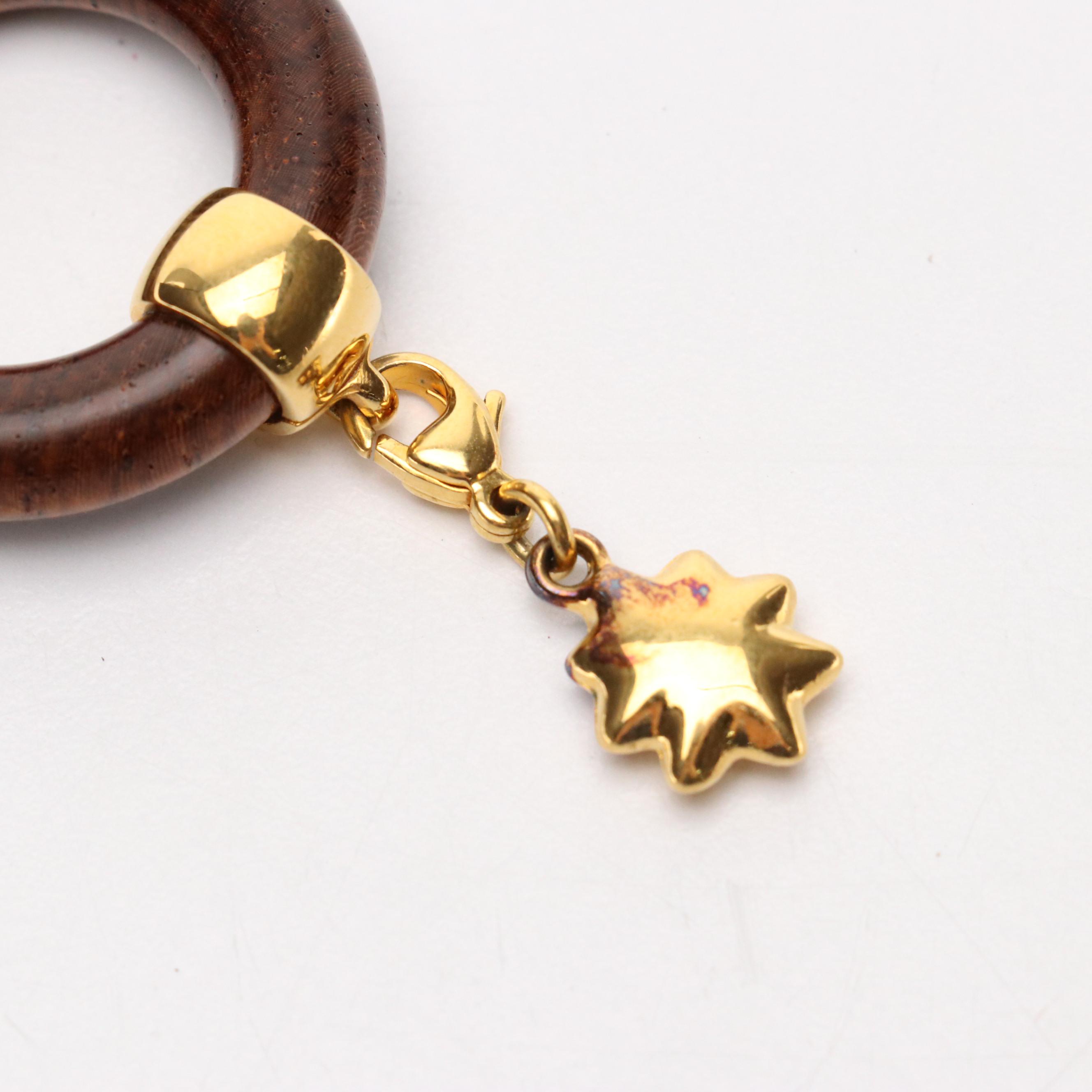 Hermès Brown Wood Comet Scarf Ring with Gold Plated Accent