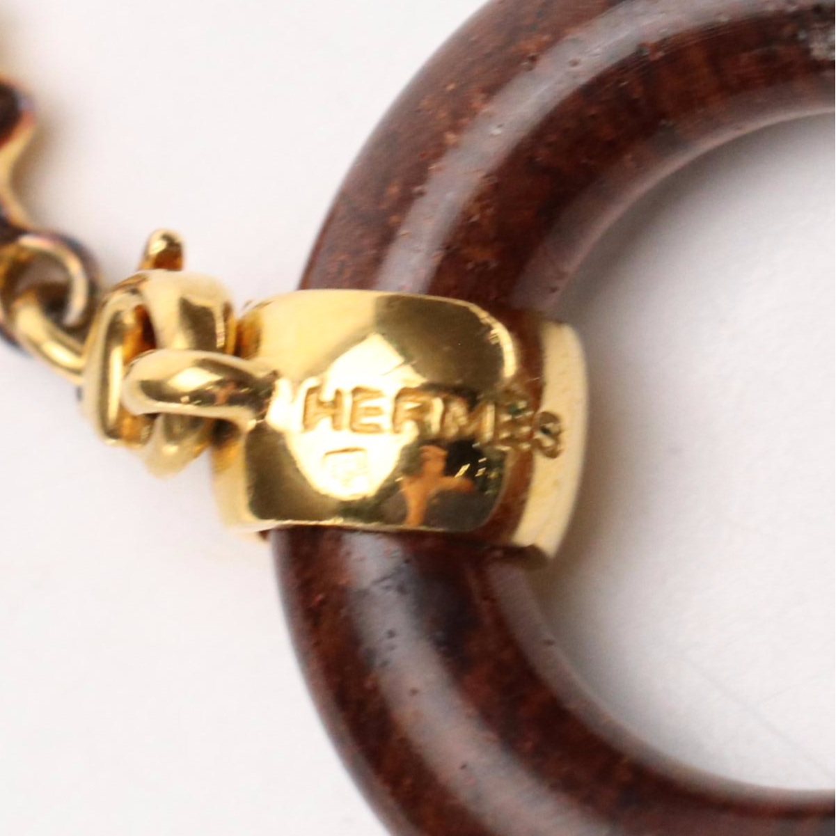Hermès Brown Wood Comet Scarf Ring with Gold Plated Accent