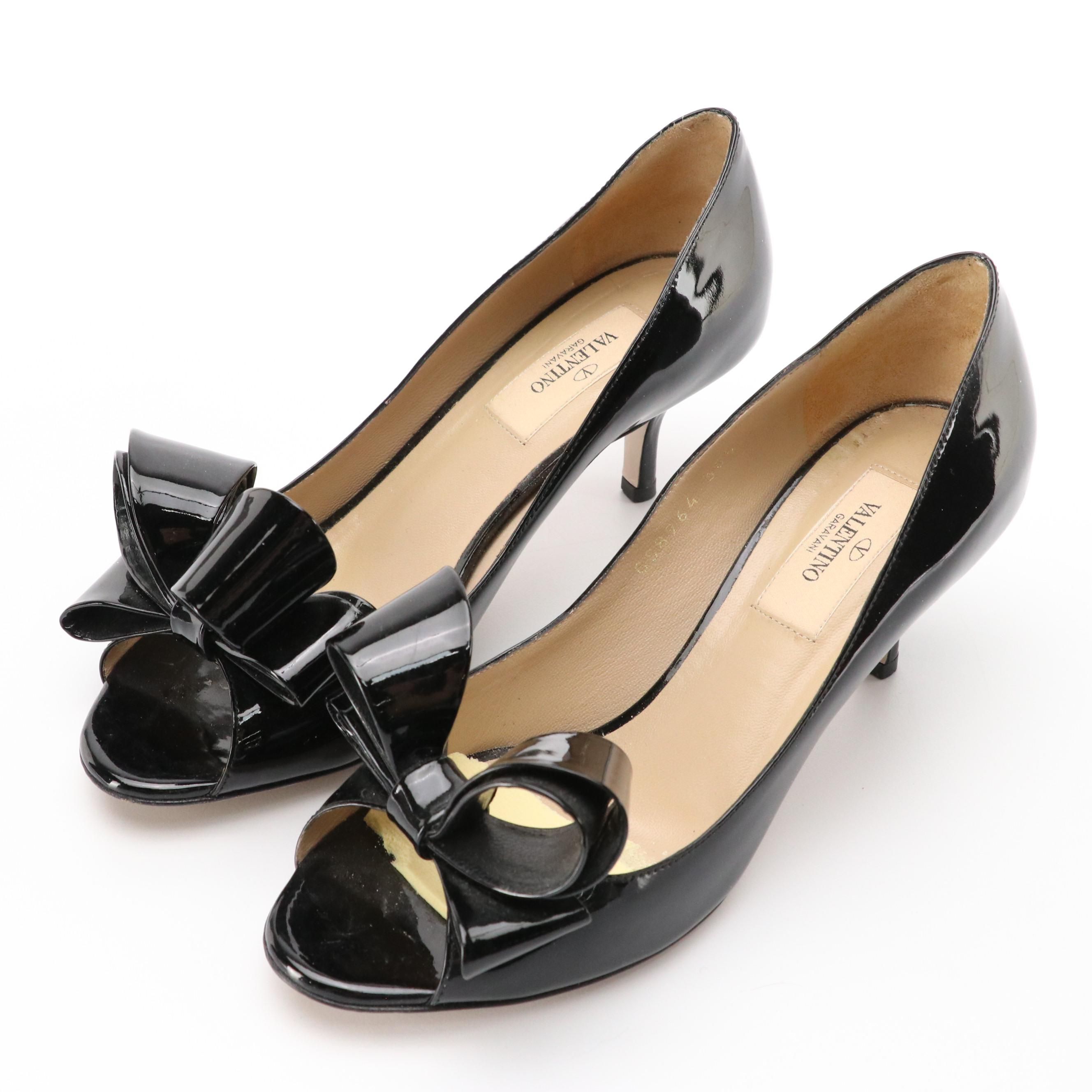 Valentino Garavani Peep Toe Bow Pumps in Black Patent Leather
