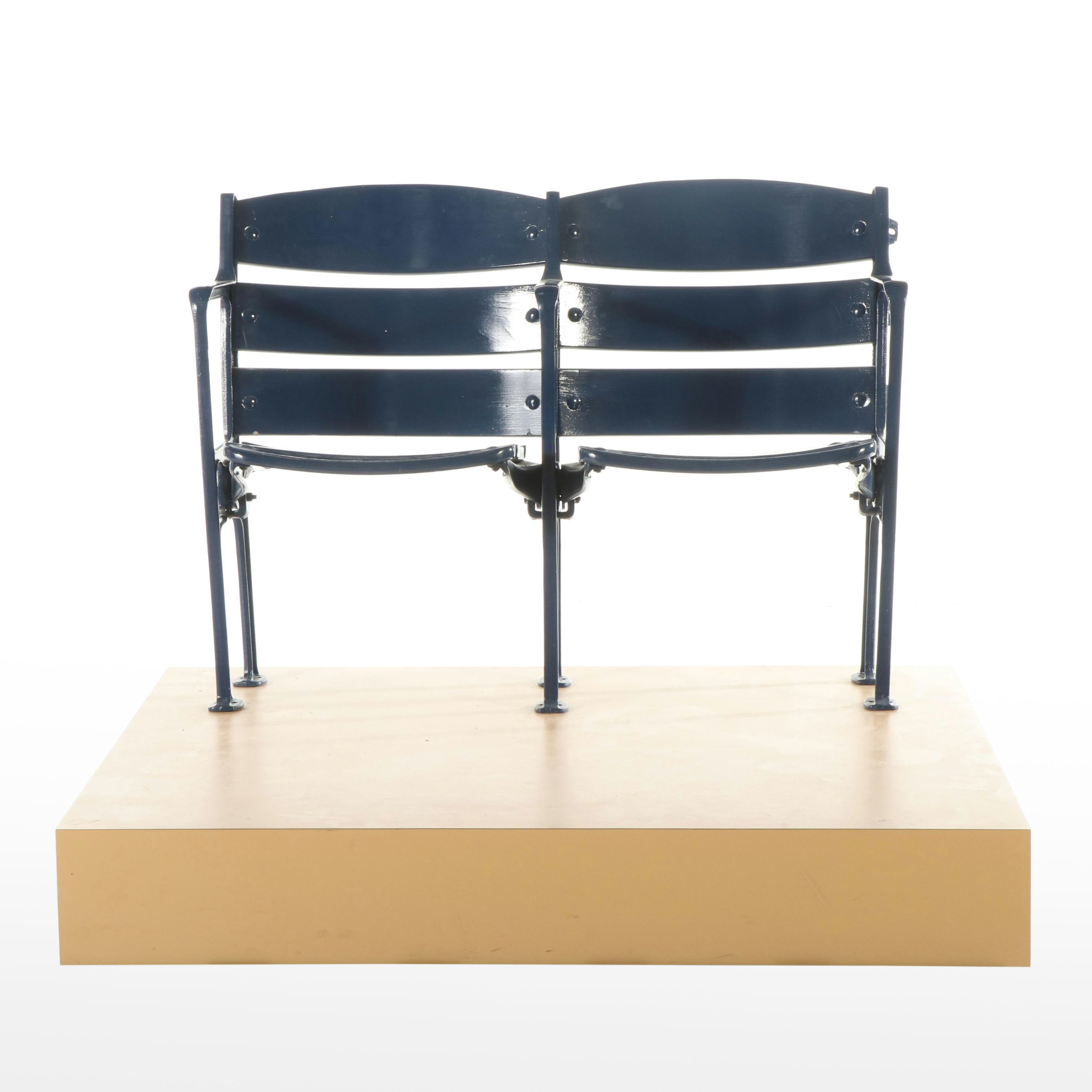 Blue Painted Wood and Metal Stadium Seats on Platform