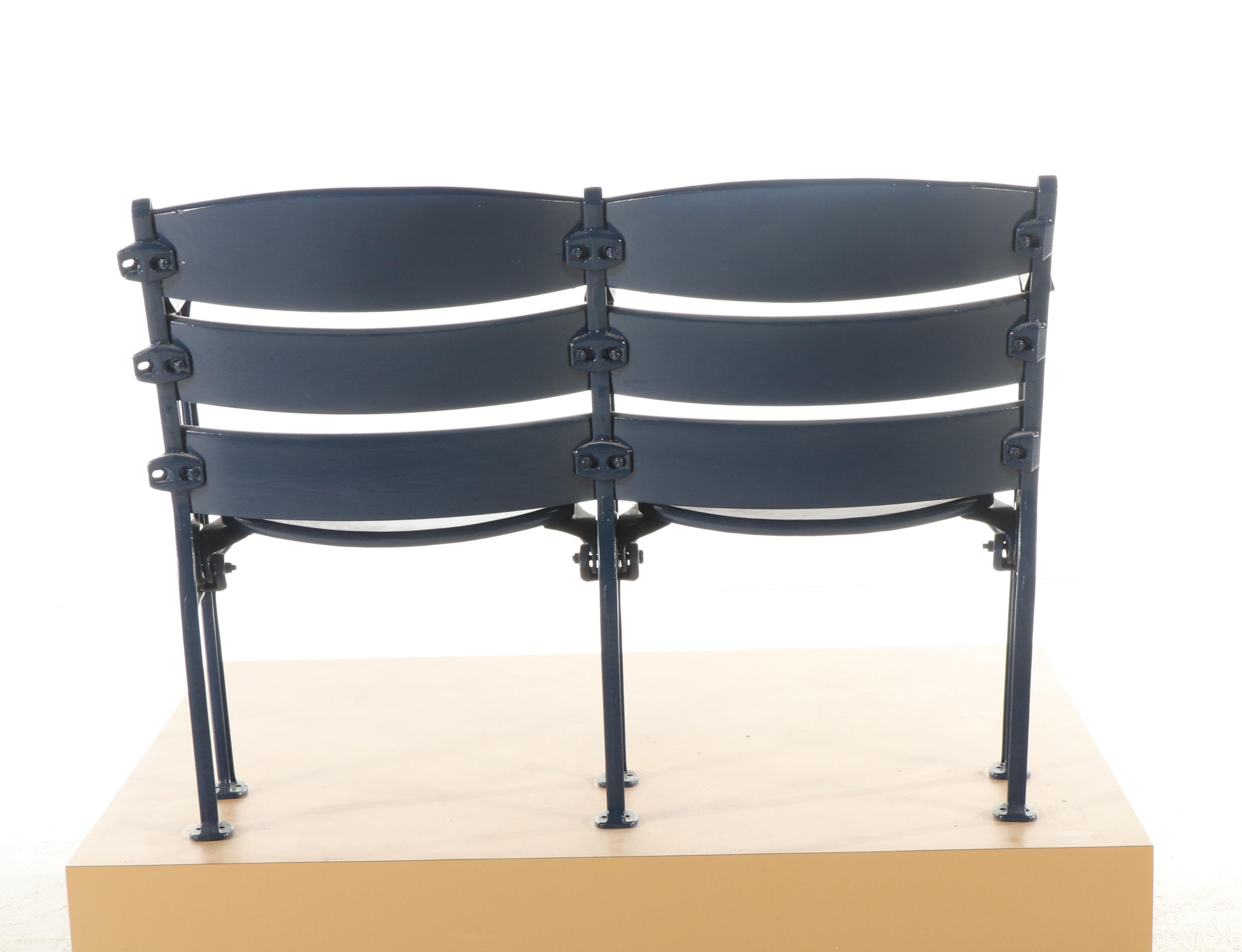 Blue Painted Wood and Metal Stadium Seats on Platform