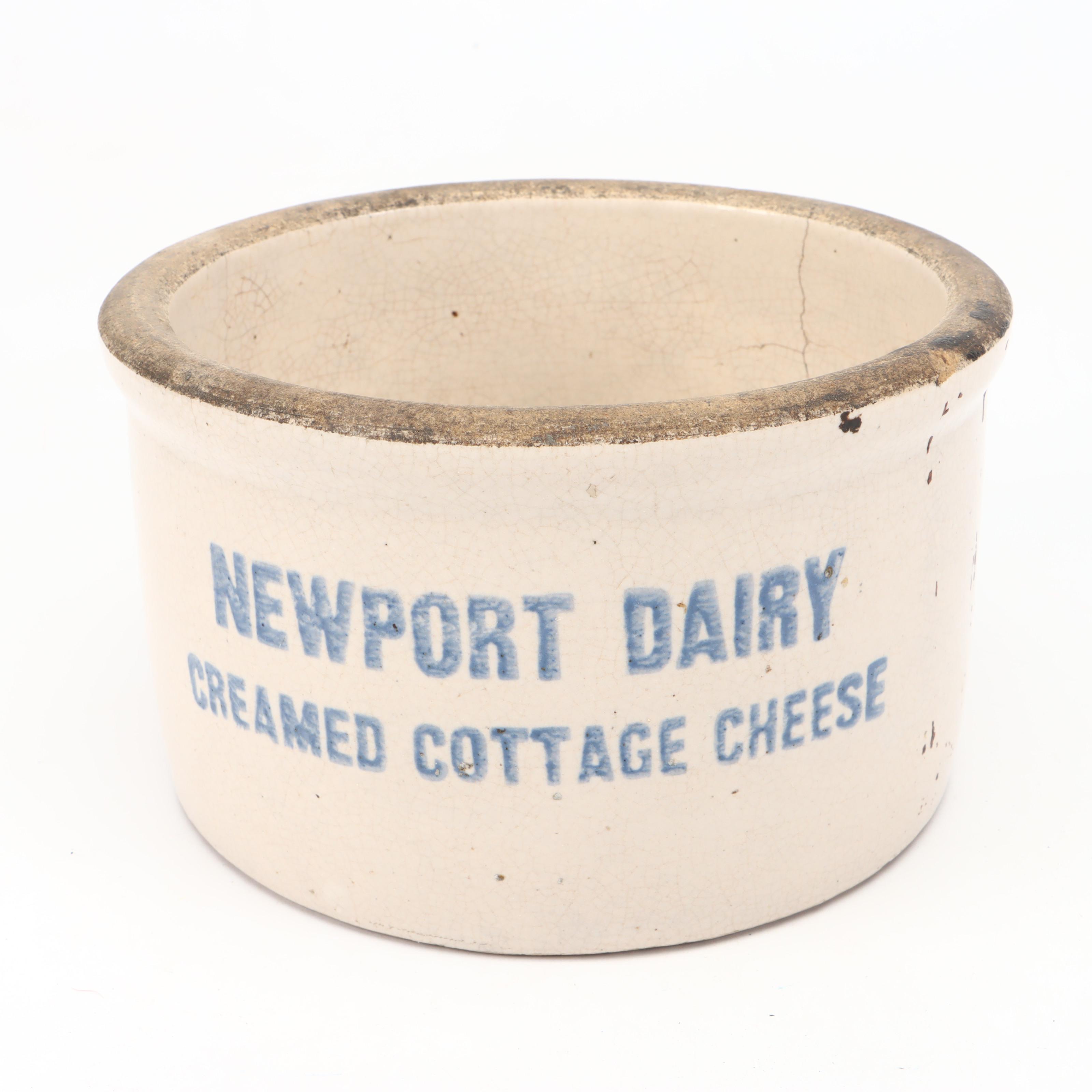 Newport Dairy Stoneware Crock, Glass Oil Can, and Wooden Spool