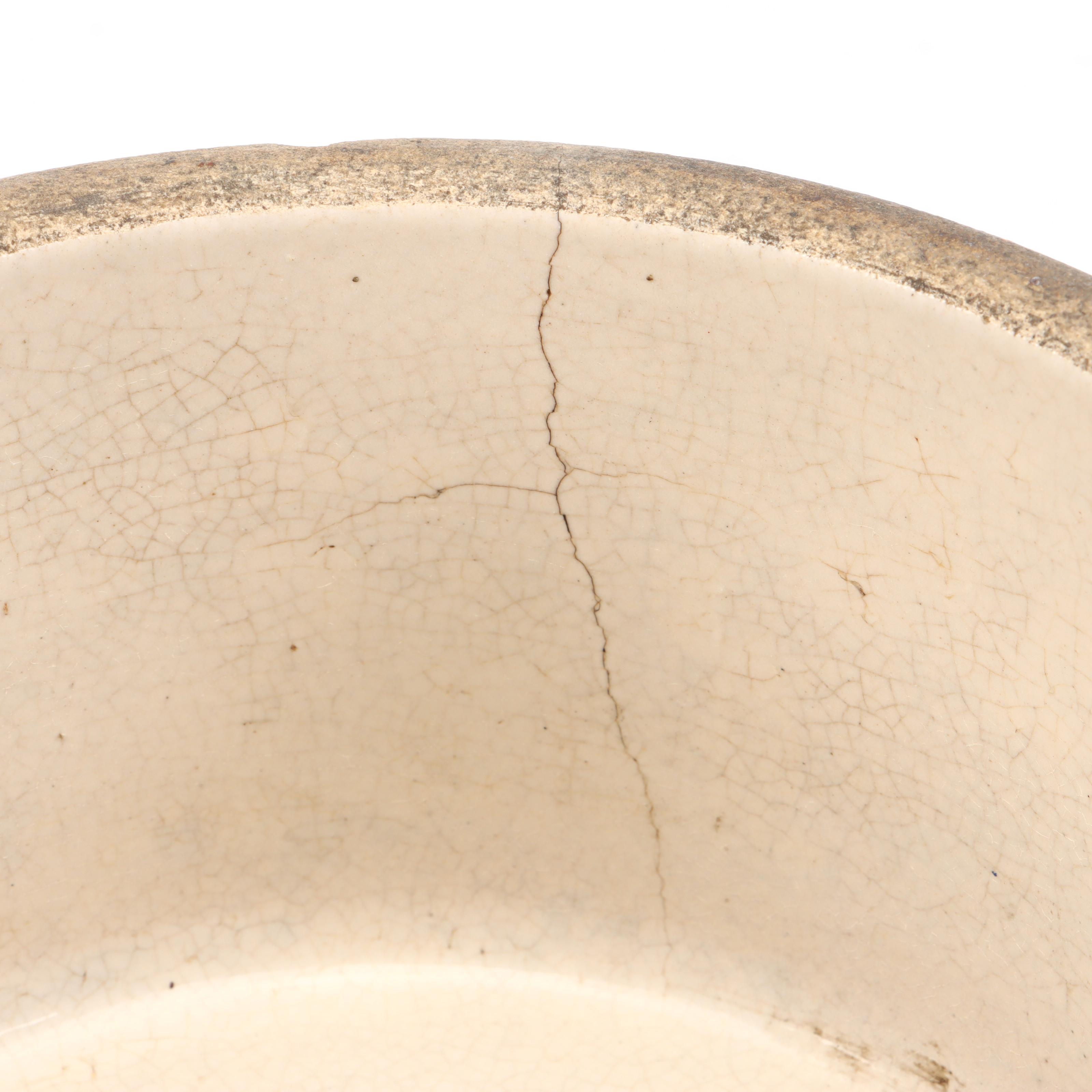 Newport Dairy Stoneware Crock, Glass Oil Can, and Wooden Spool