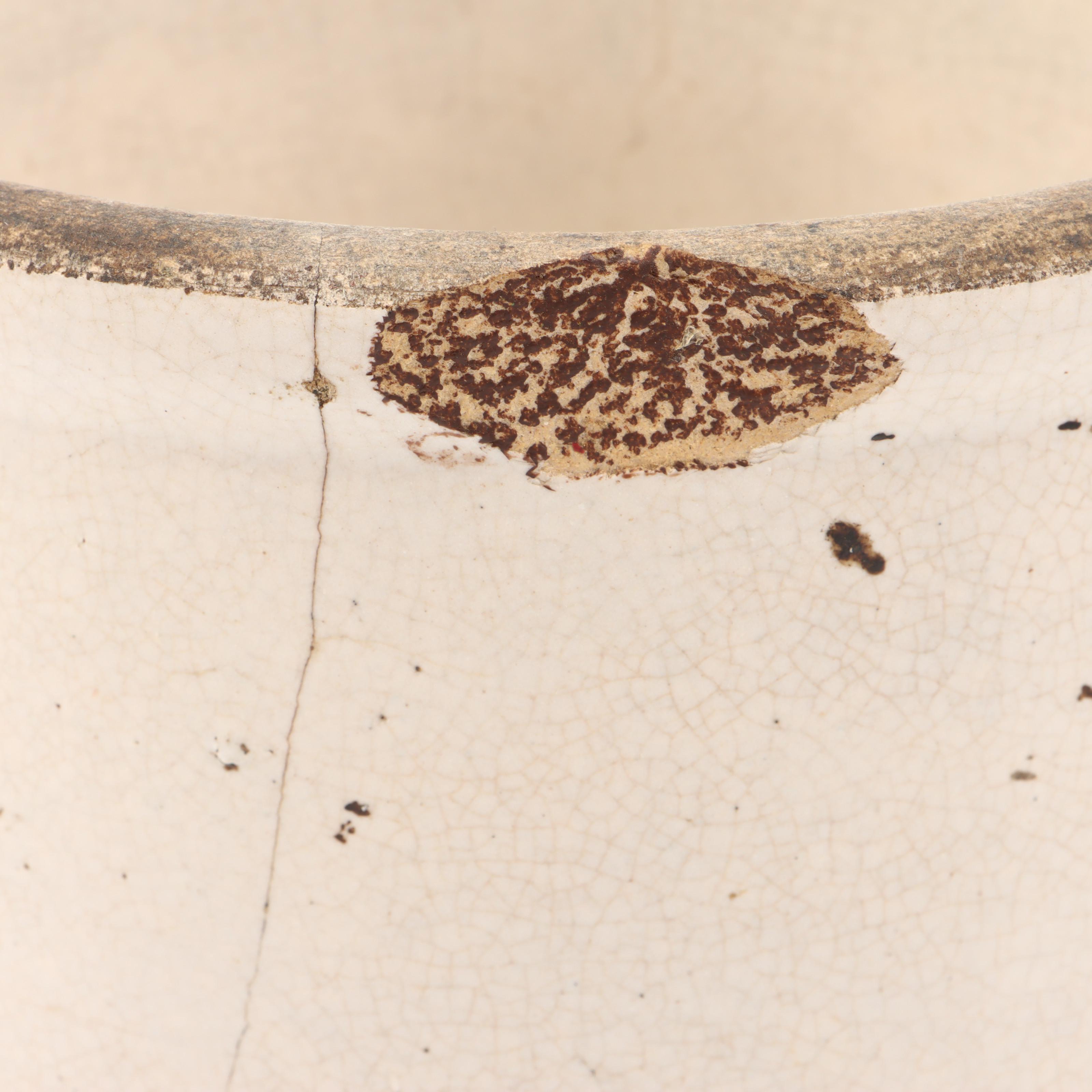 Newport Dairy Stoneware Crock, Glass Oil Can, and Wooden Spool