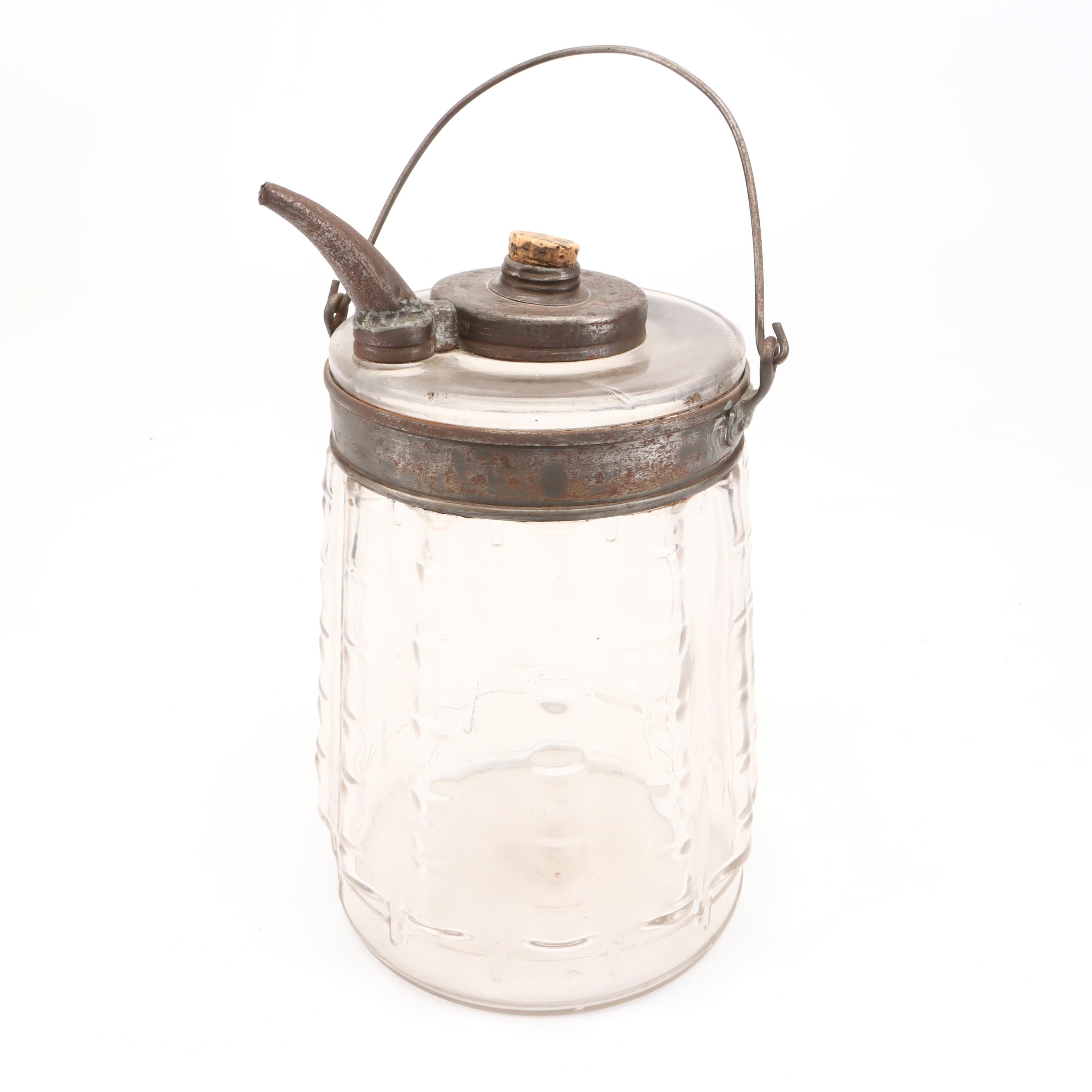 Newport Dairy Stoneware Crock, Glass Oil Can, and Wooden Spool