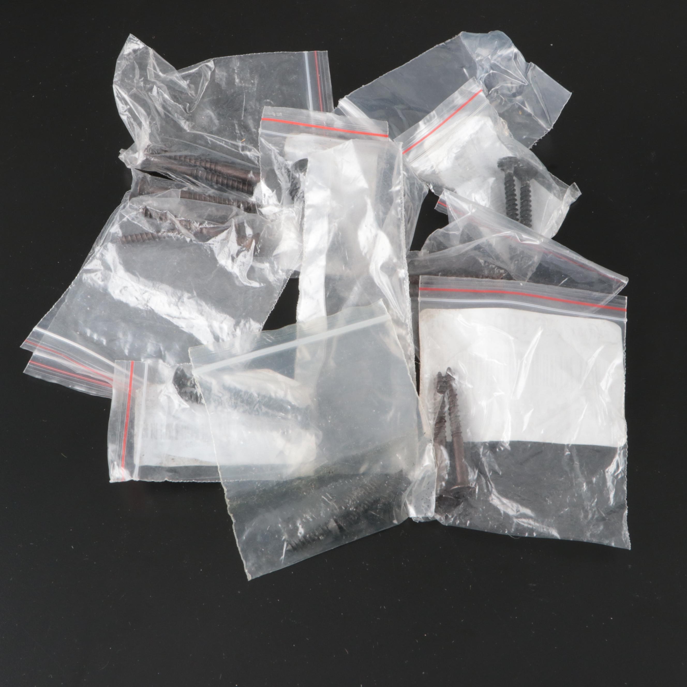 Assorted Metal Bolts, Screws, and Other Home Hardware