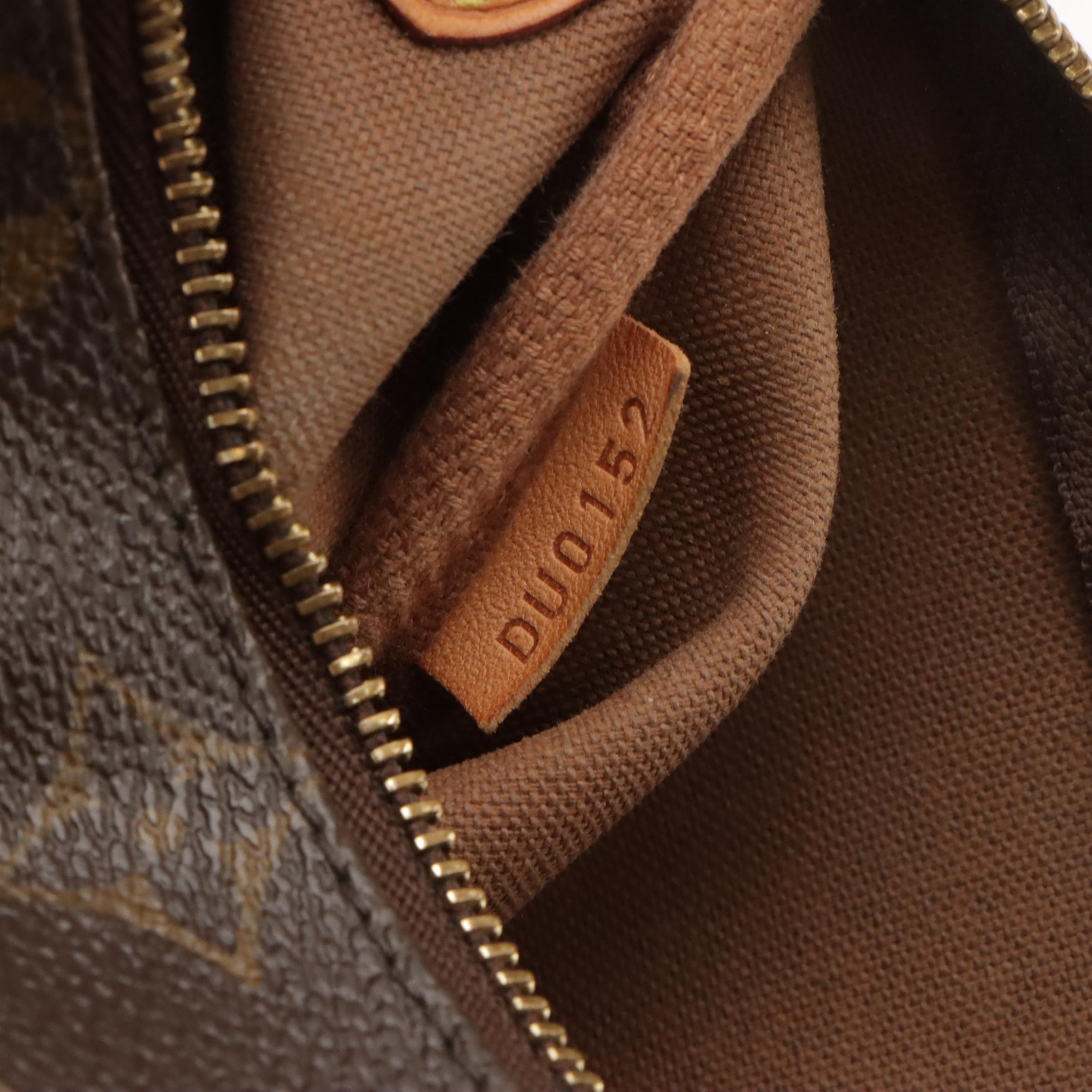Louis Vuitton Eva Pochette in Monogram Canvas with Chain-Link Strap