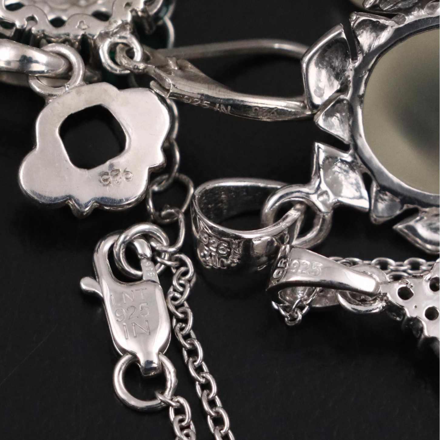 14 Assorted Sterling Silver Rings, Necklaces, Earrings, and Pendants