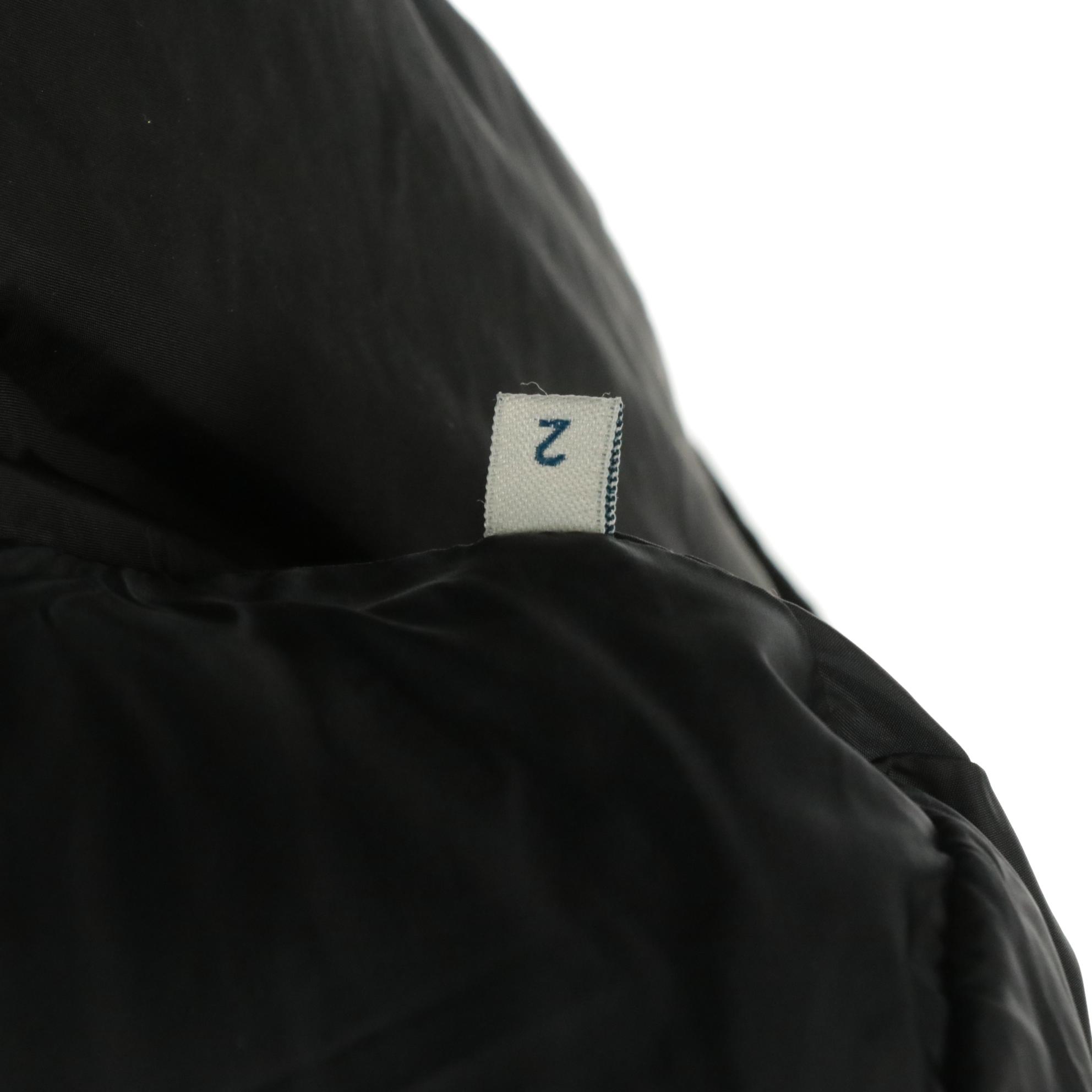 Moncler Puffer Peplum Jacket in Black Quilted Nylon