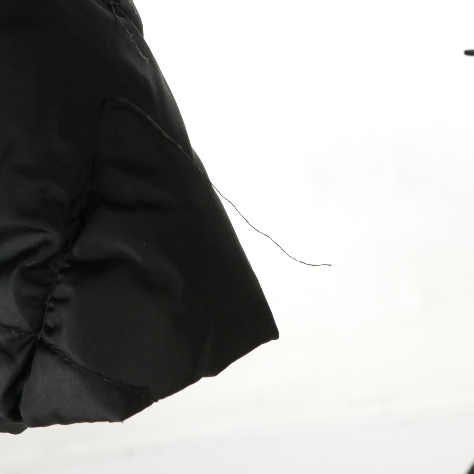 Moncler Puffer Peplum Jacket in Black Quilted Nylon