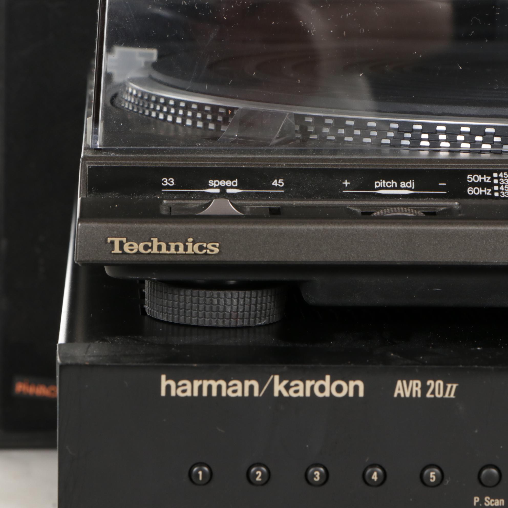 Harman/Kardon AVR 20II Receiver, Technics Turntable, Samsung TV, and Speakers