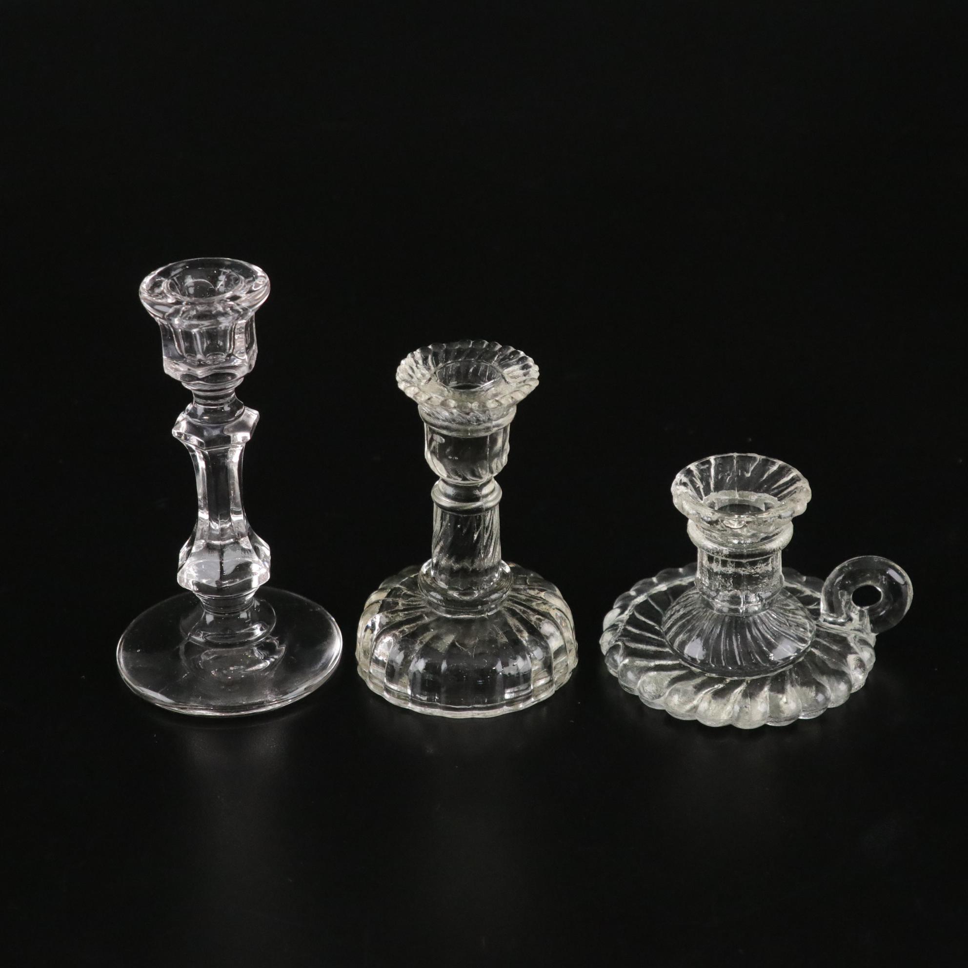 Glassware with Candle Sticks, Shakers, Tumblers, and a Bowl