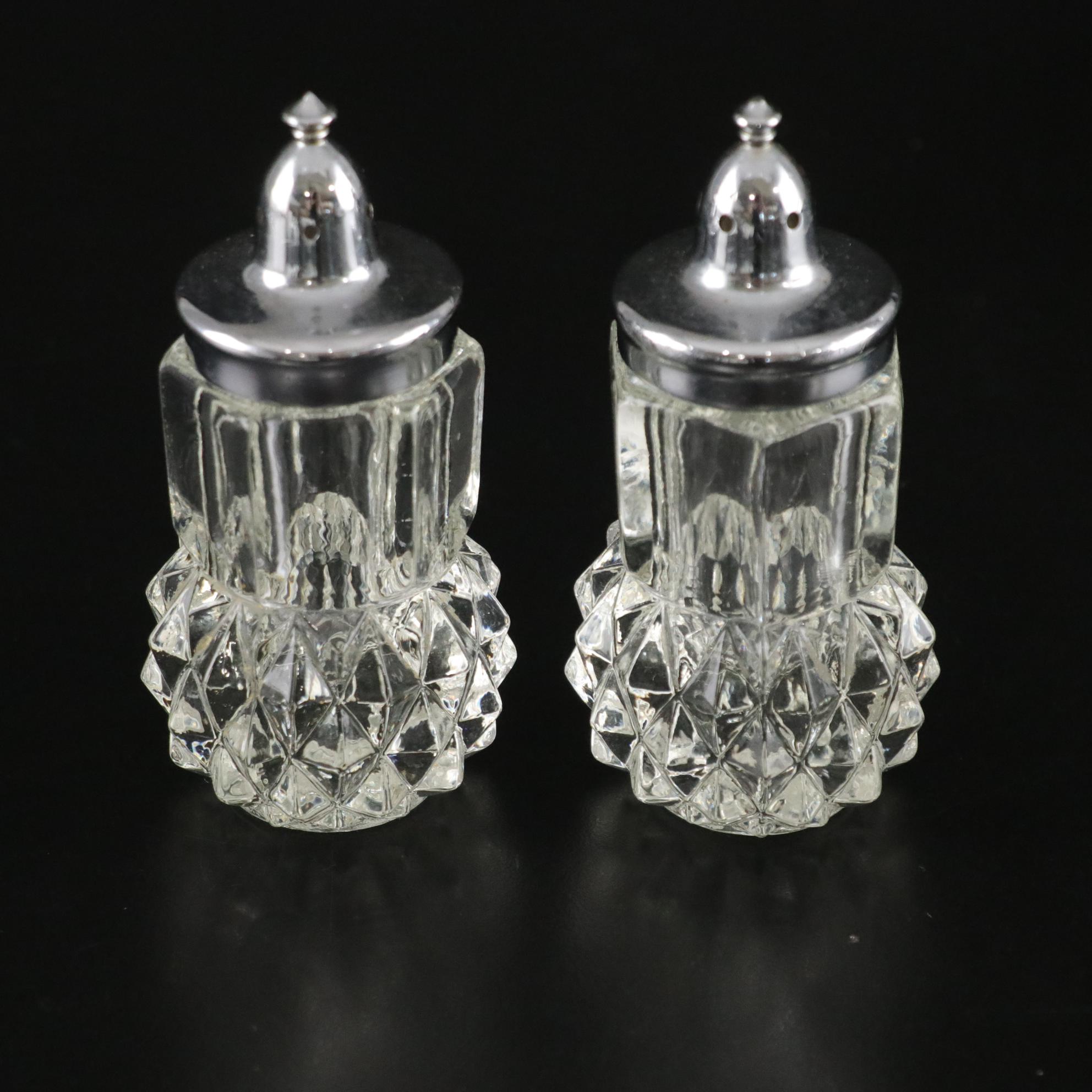 Glassware with Candle Sticks, Shakers, Tumblers, and a Bowl