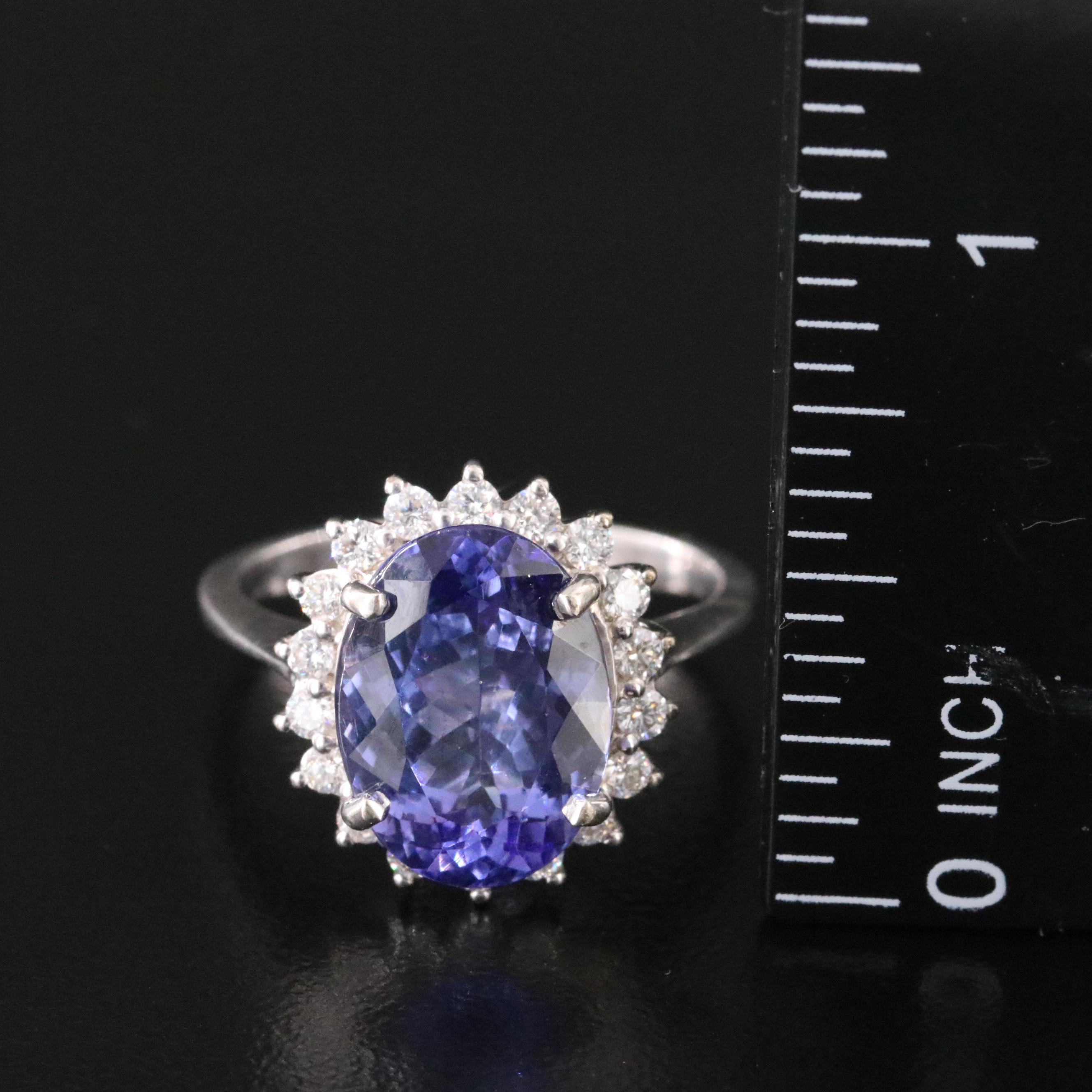 18K 5.02 CT Tanzanite and Diamond Halo Ring