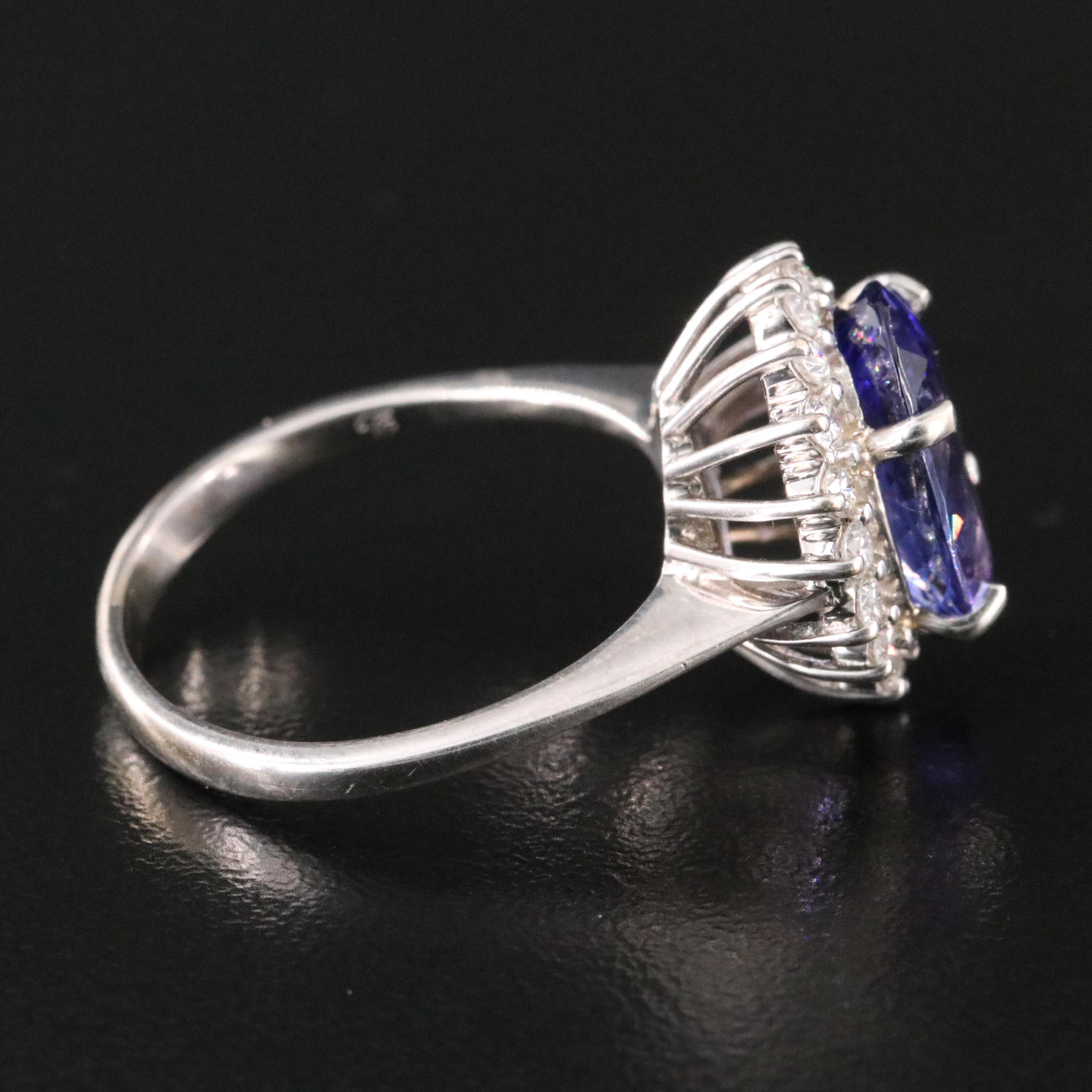 18K 5.02 CT Tanzanite and Diamond Halo Ring