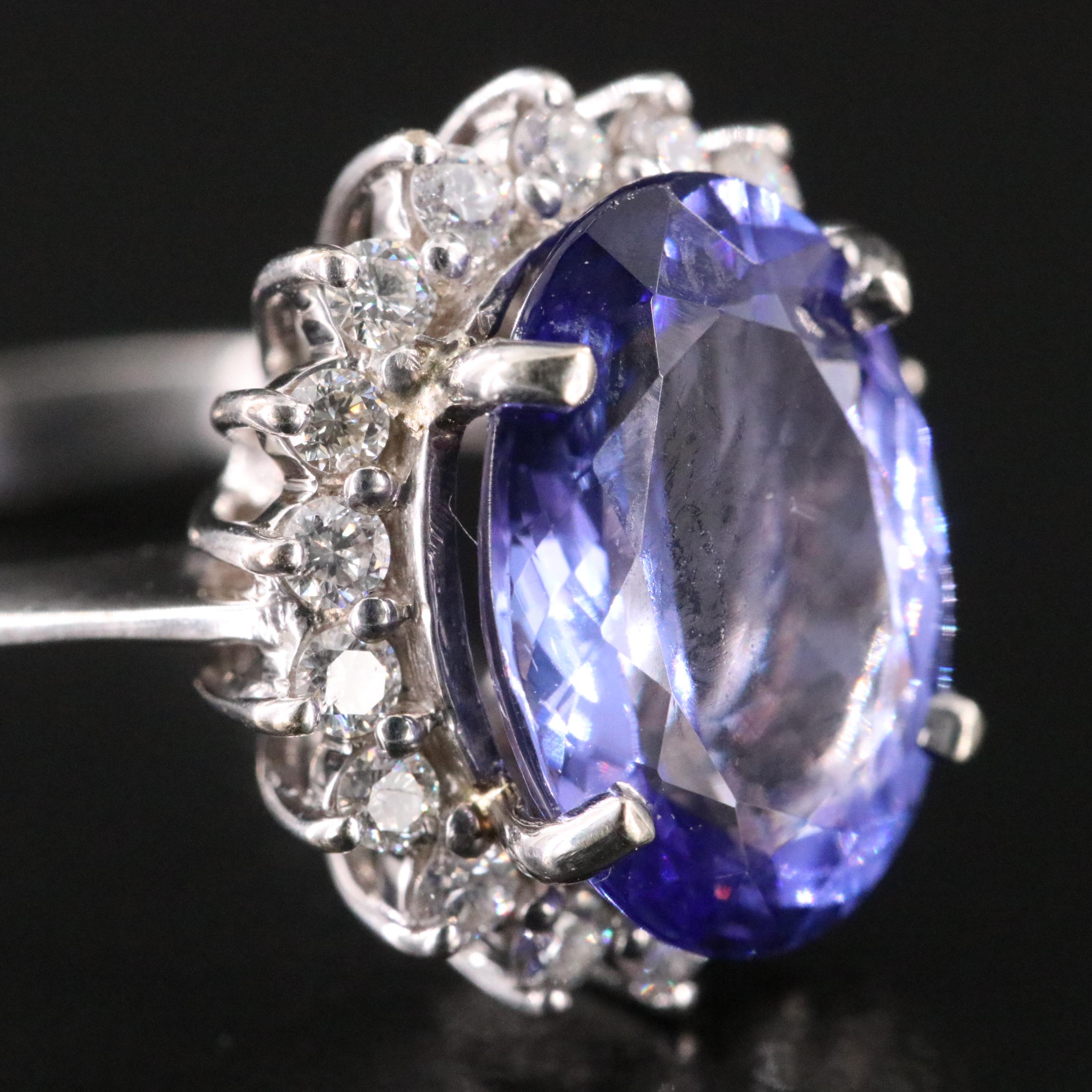 18K 5.02 CT Tanzanite and Diamond Halo Ring