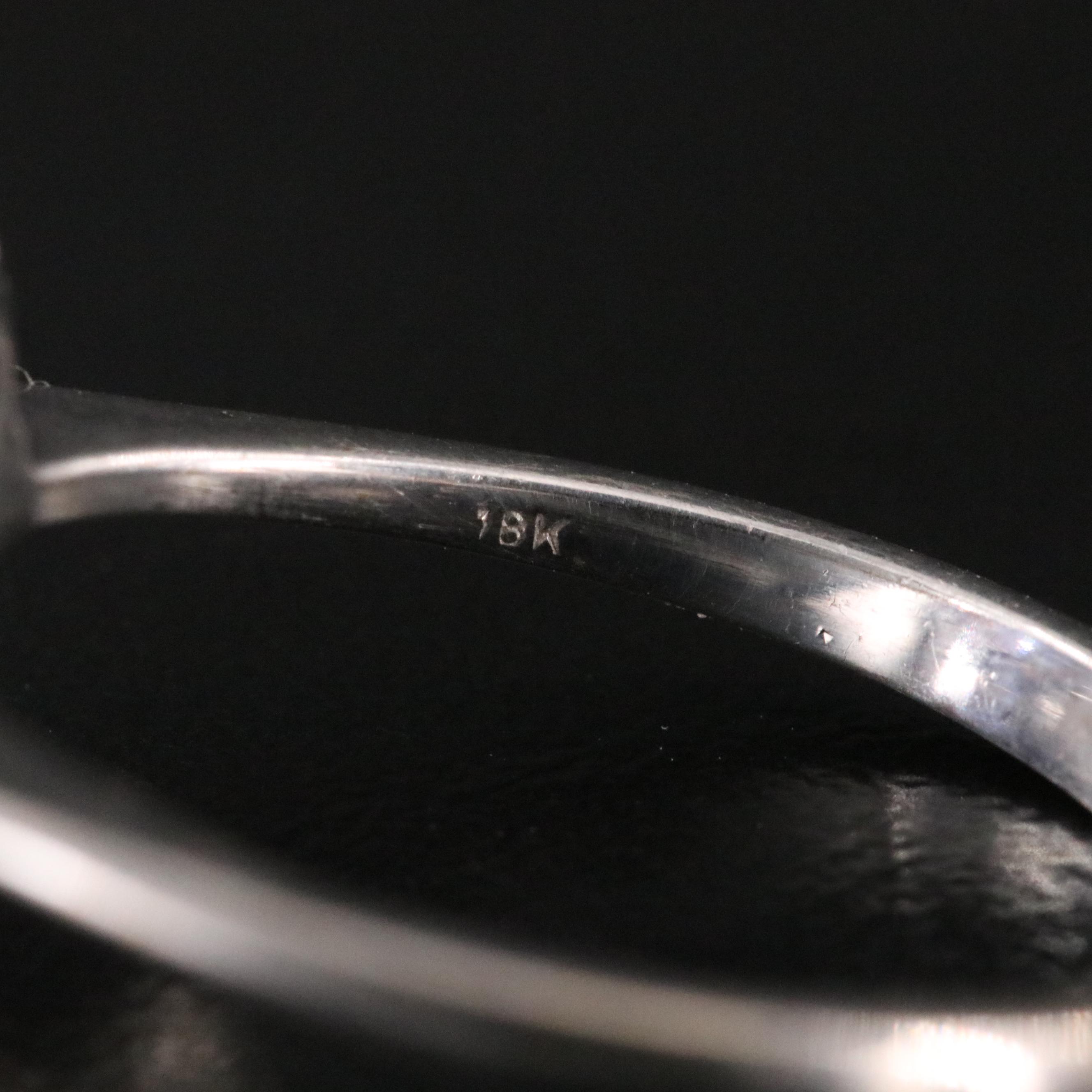 18K 5.02 CT Tanzanite and Diamond Halo Ring