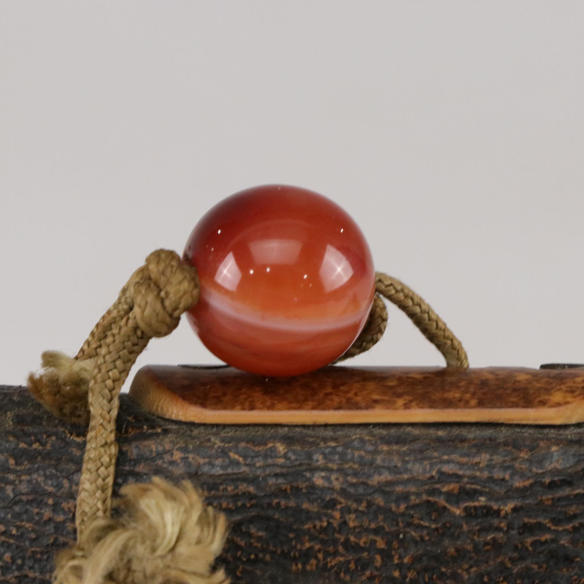 Japanese Kiseru Leather Tobacco Pouch With Figural Decoration and Bead